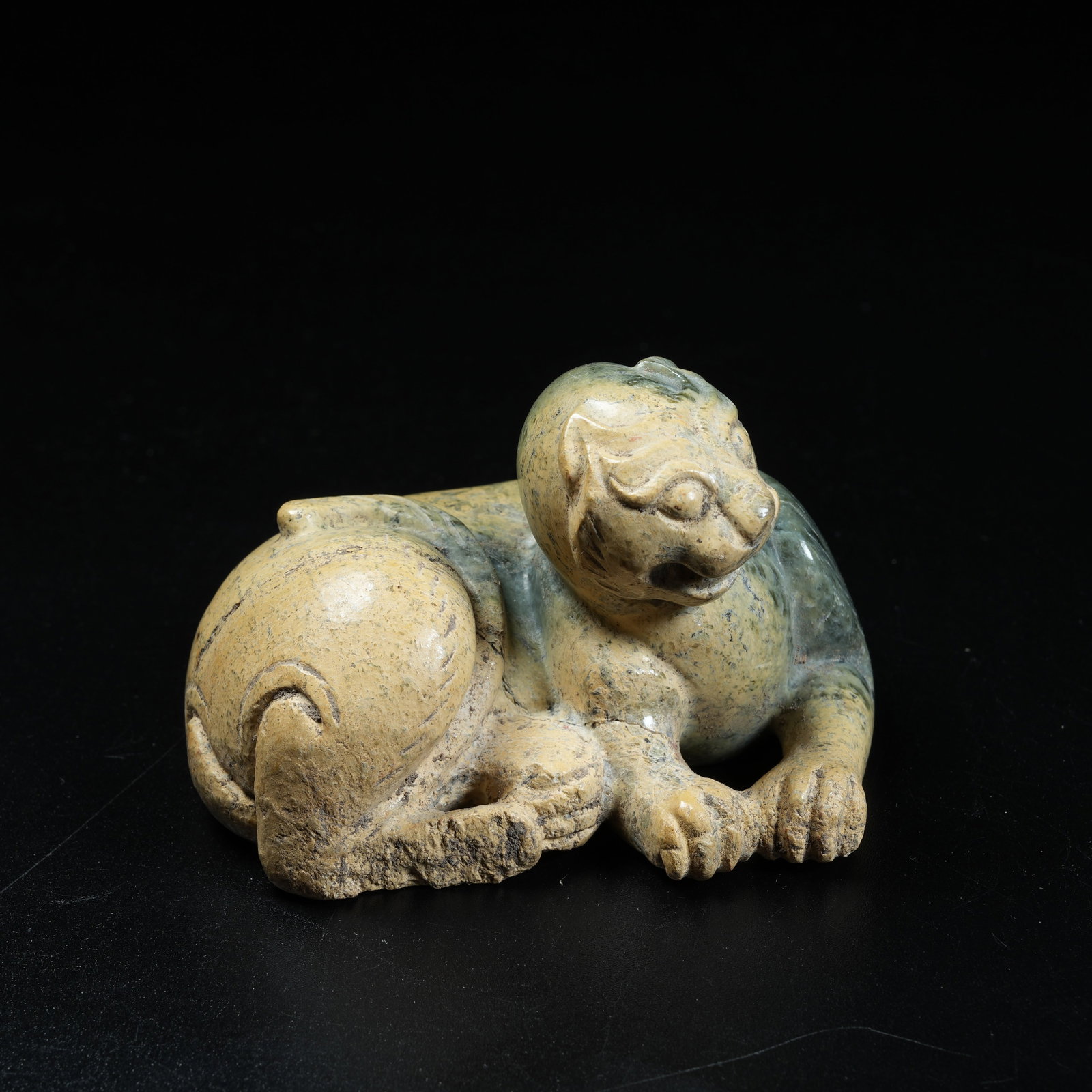 A ANCIENT JADE RECLINING BEAST ORNAMENT: Ancient Jade Reclining Beast Ornament