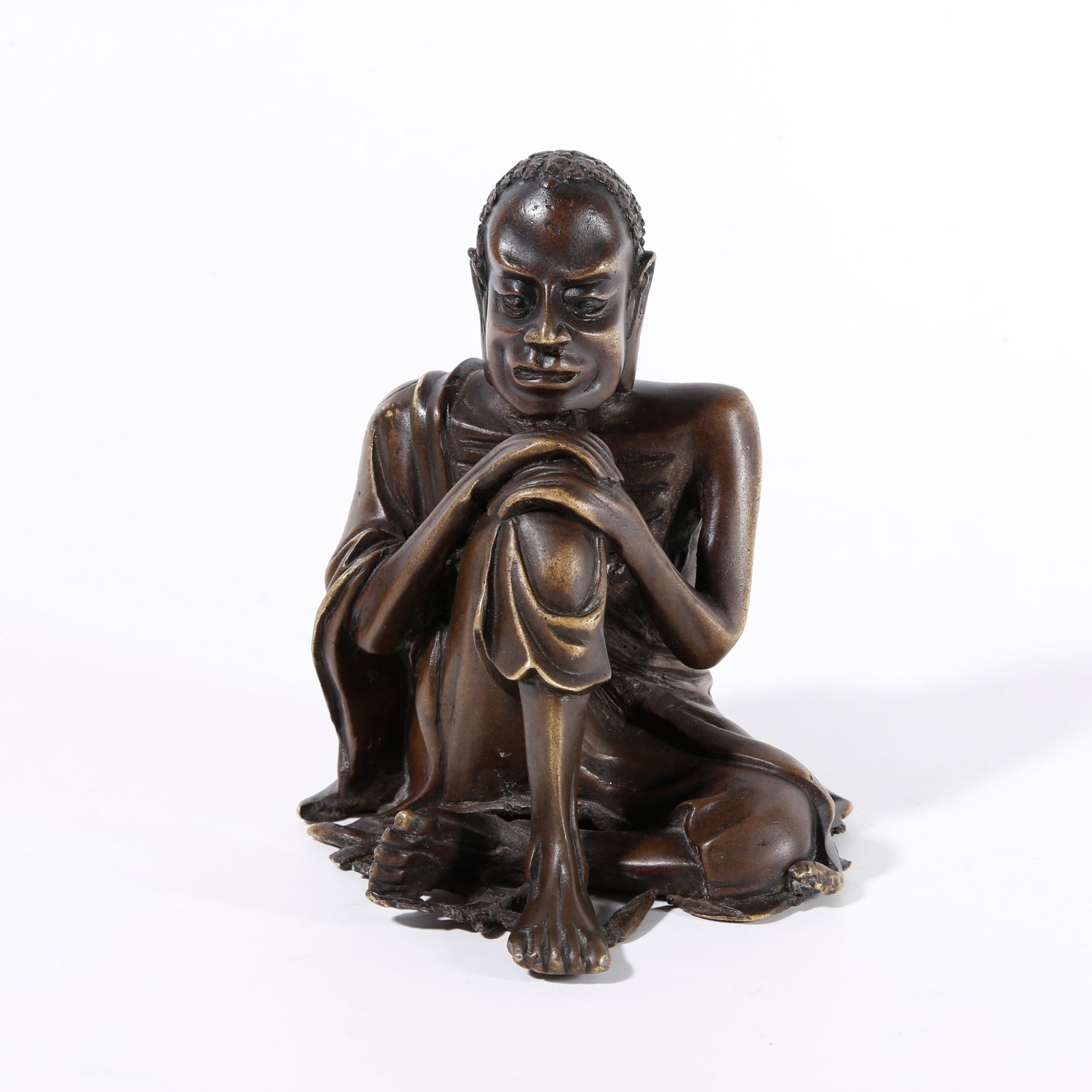 A BRONZE STATUE OF SNOW MOUNTAIN ASCETIC: Bronze statue of Snow Mountain Ascetic