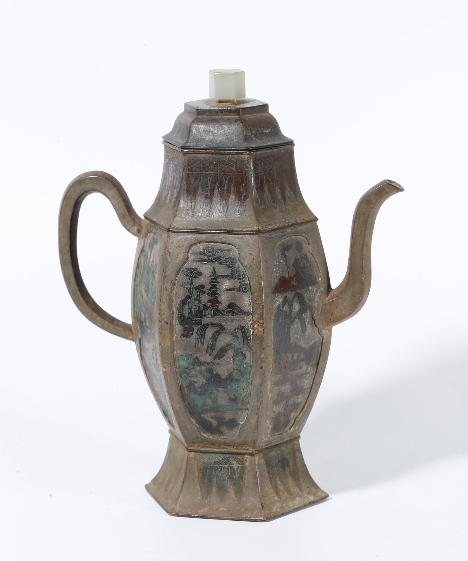 A BRONZE EWER WITH LANDSCAPE PATTERN: Bronze ewer with landscape pattern