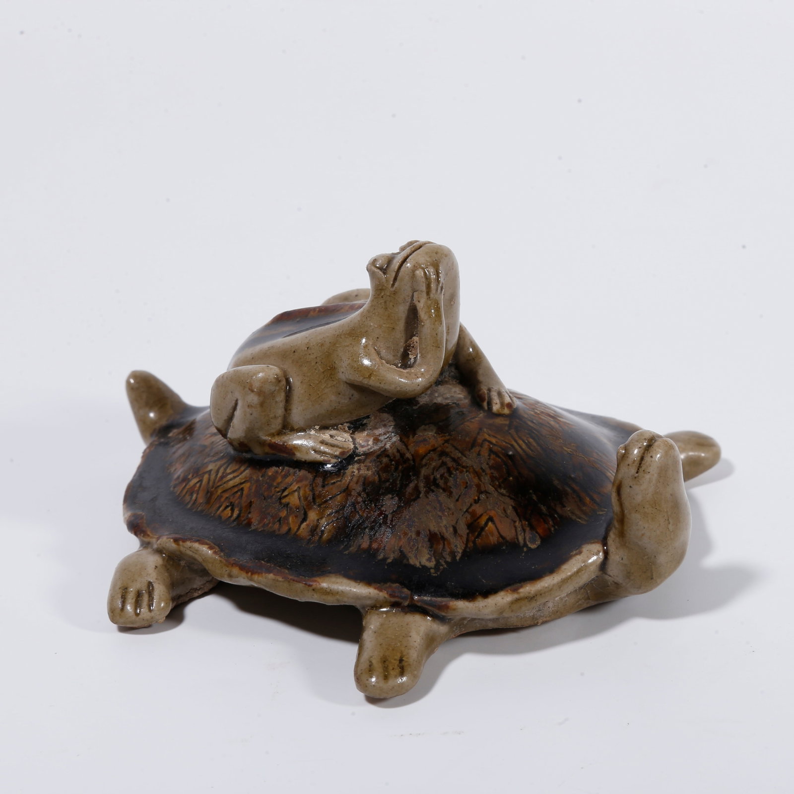 A YUE-KILN BEAST-SHAPED ORNAMENT: Yue-kiln beast-shaped ornament