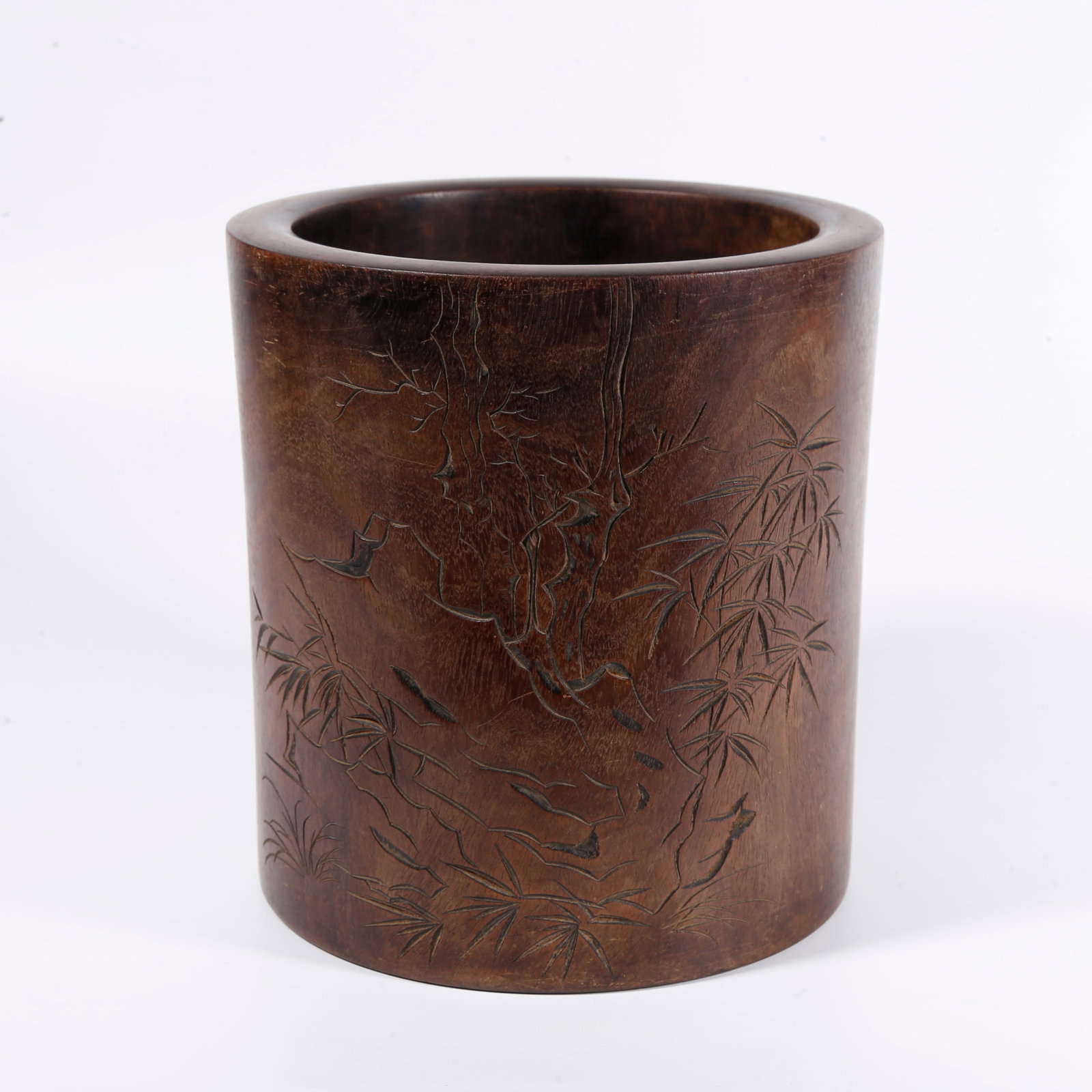 A BRUSH POT CARVED WITH BAMBOO AND STONE PATTERN IN ZITAN WOOD ATTRIBUTED TO ZHAO MENGFU: Brush pot carved with bamboo and stone pattern in zitan wood attributed to Zhao Mengfu