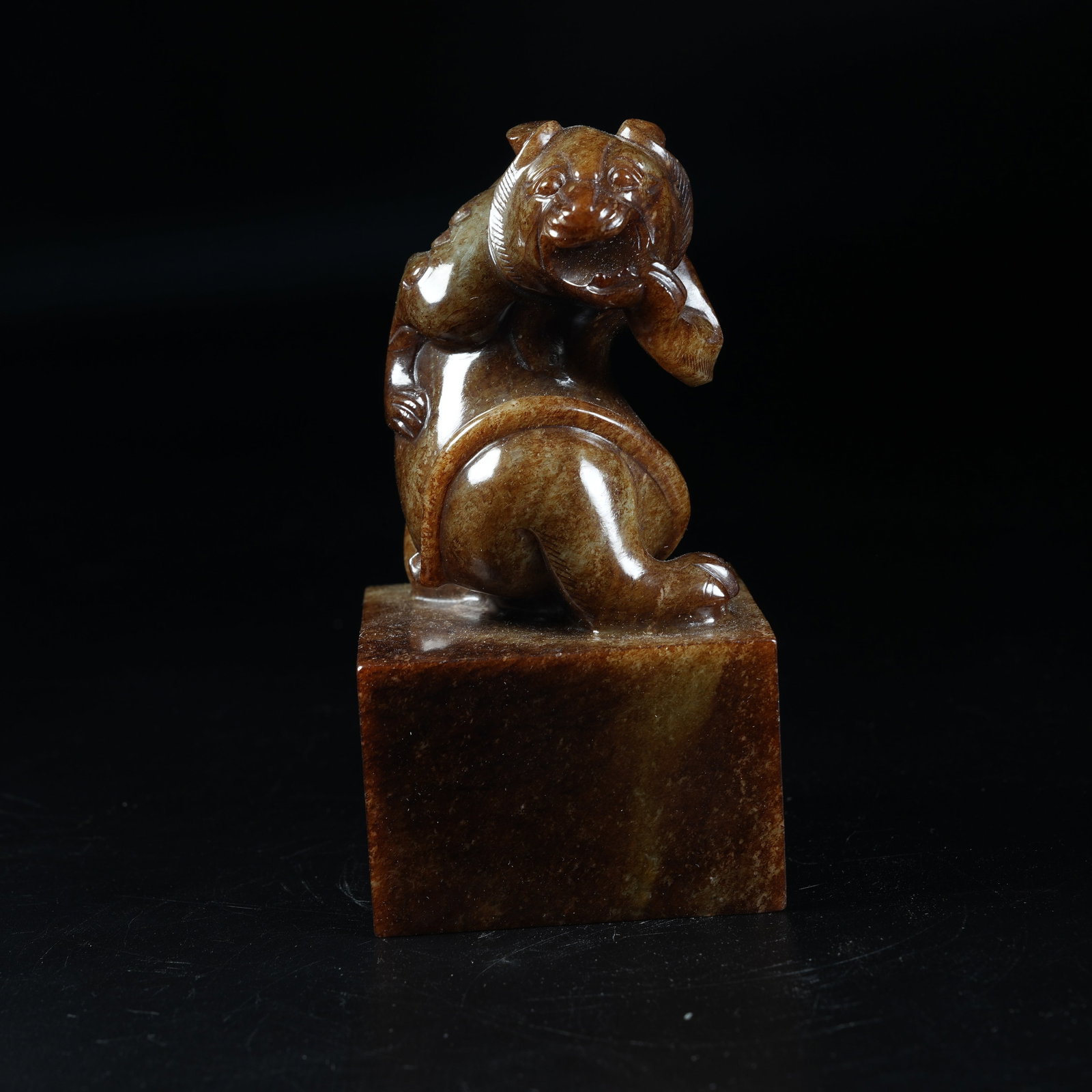 A ANCIENT JADE SEAL WITH BEAR KNOB: Ancient Jade Seal with Bear Knob