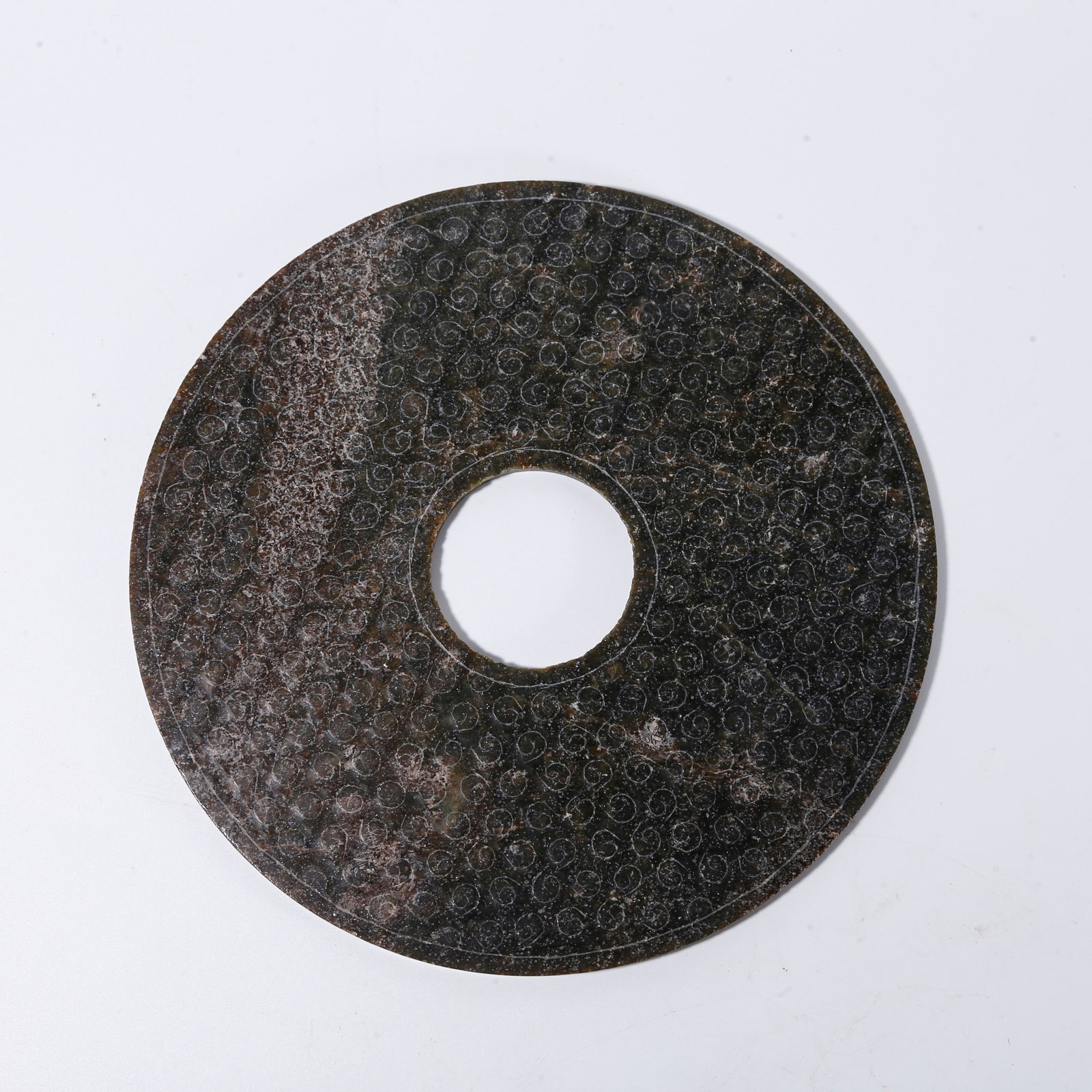 A ANCIENT JADE BI-DISC: Ancient jade bi-disc