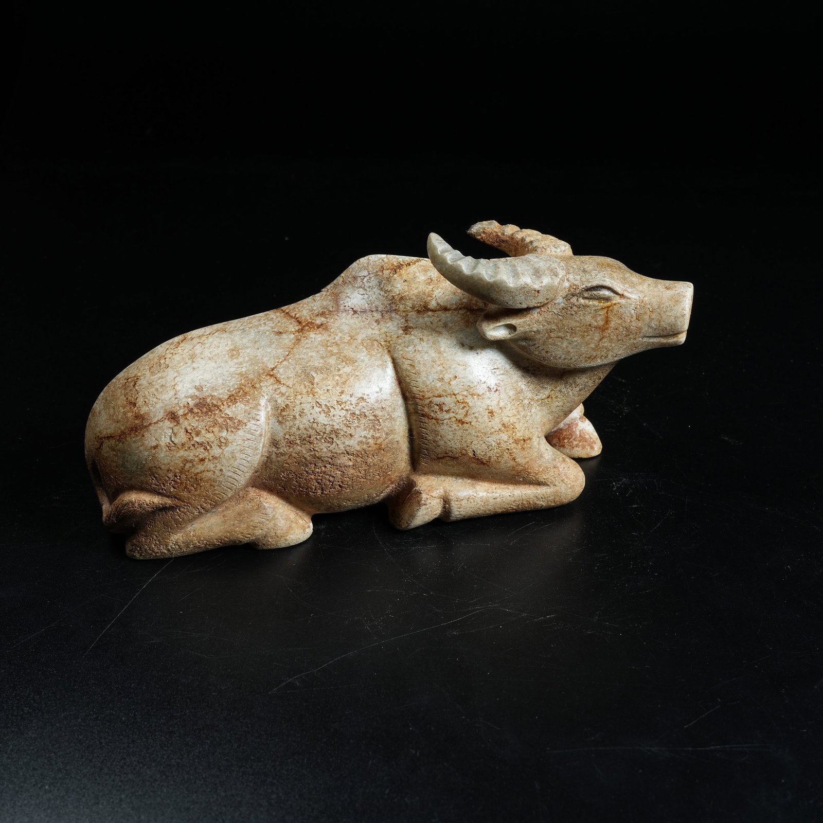 A ANCIENT JADE RECLINING OX ORNAMENT (1 of 8)
