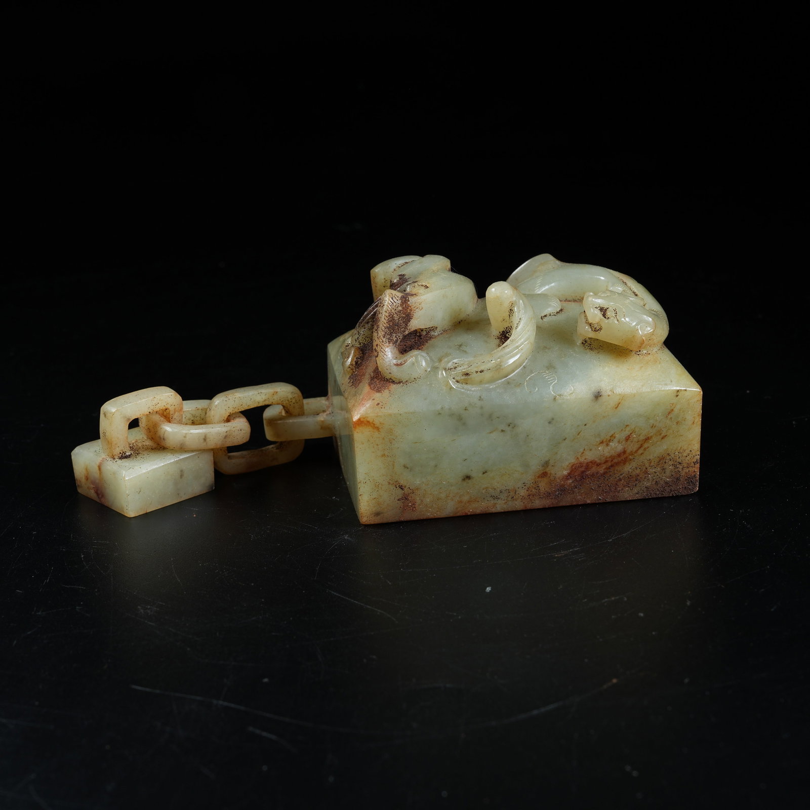 A ANCIENT JADE DOUBLE LINKED SEAL WITH CHI DRAGON PATTERN (1 of 8)