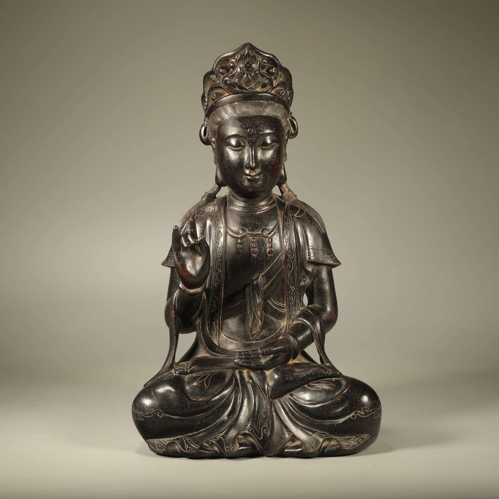 A SEATED GUANYIN STATUE CARVED ON ZITAN WOOD (1 of 7)