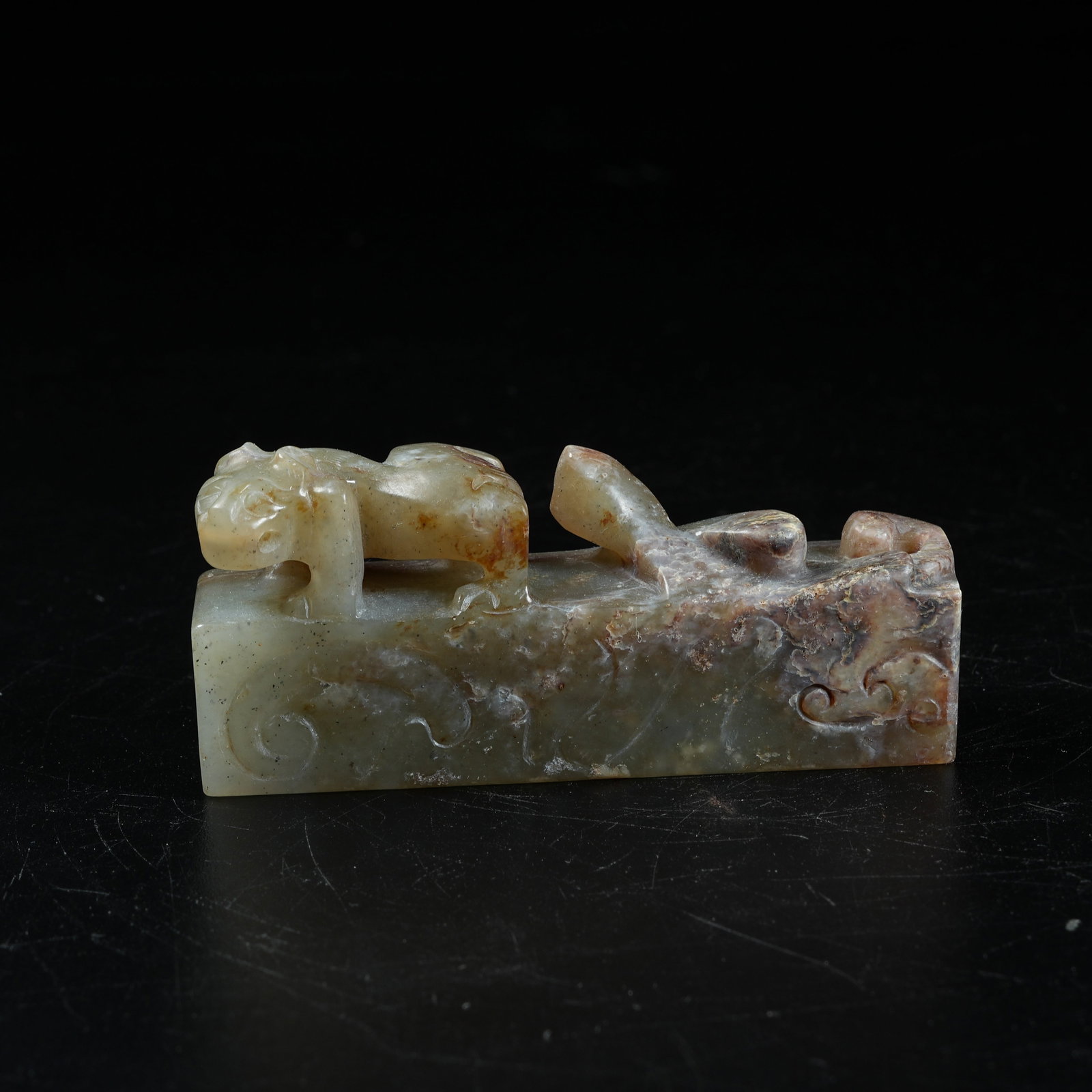 A ANCIENT JADE ORNAMENT WITH CHI DRAGON PATTERN (1 of 9)