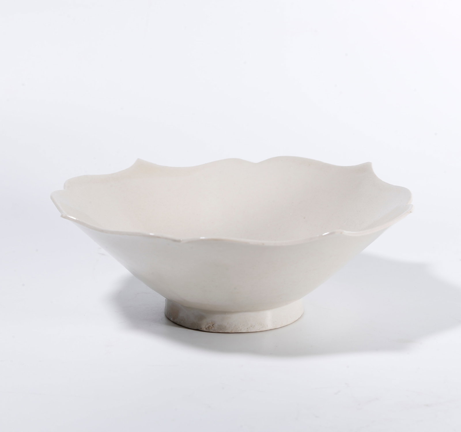 A DING WARE FLOWER-MOUTHED BOWL: Ding ware flower-mouthed bowl