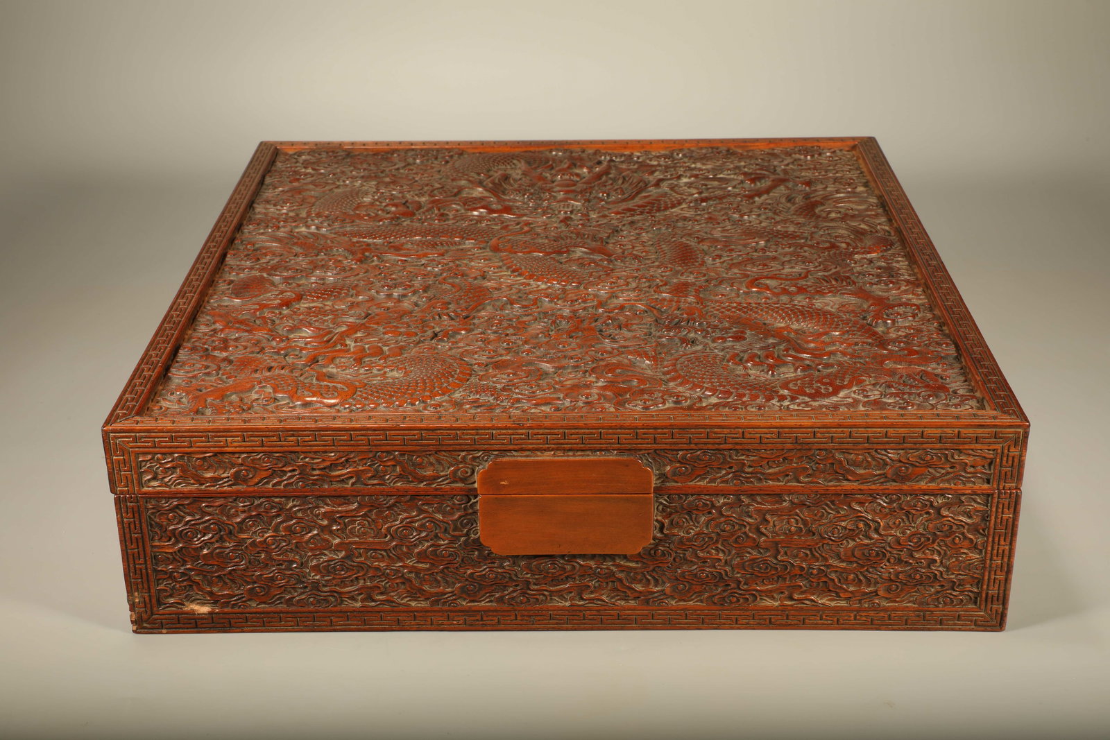 A HUANGHUALI BOX CARVED WITH DRAGON PATTERNS (1 of 8)