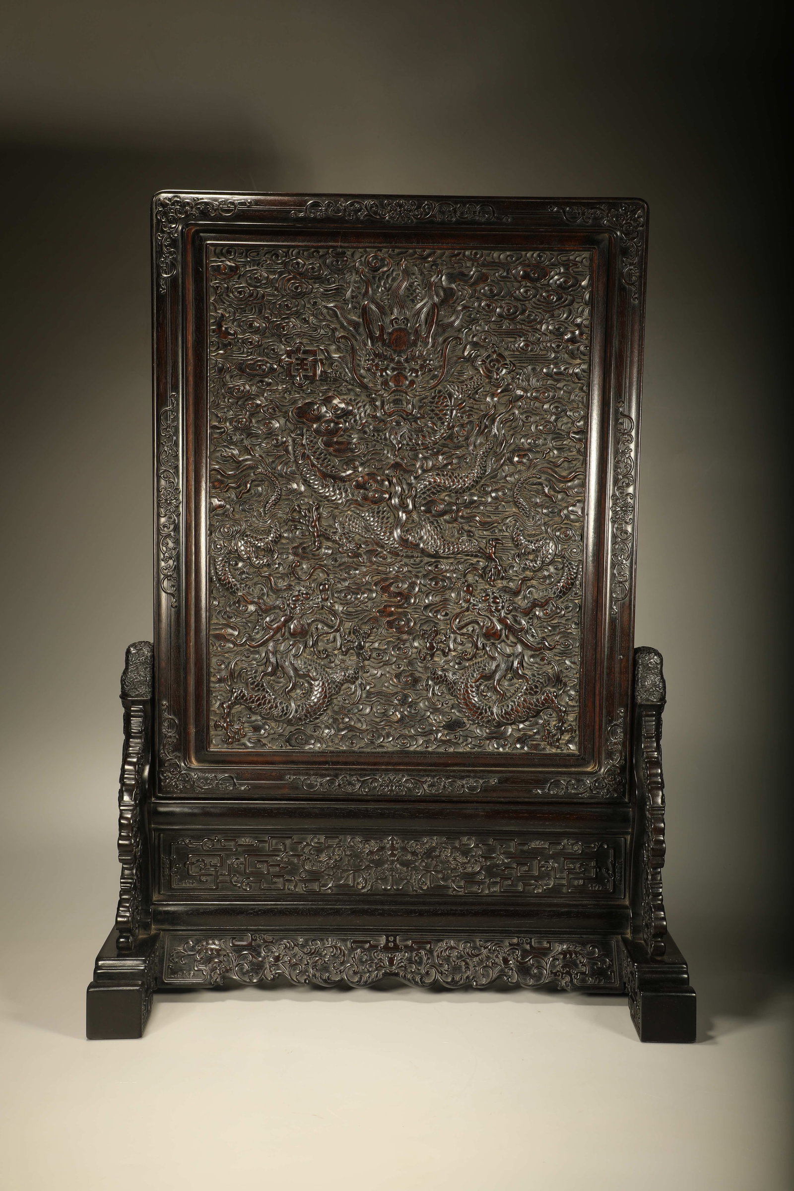 A SANDALWOOD TABLE SCREEN CARVED WITH DRAGON PATTERNS AND INSCRIBED VERSES (1 of 7)