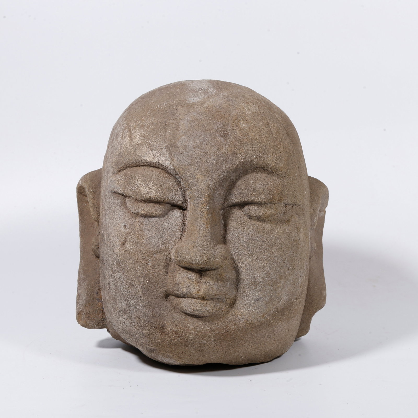 A STONE BUDDHA HEAD (1 of 9)