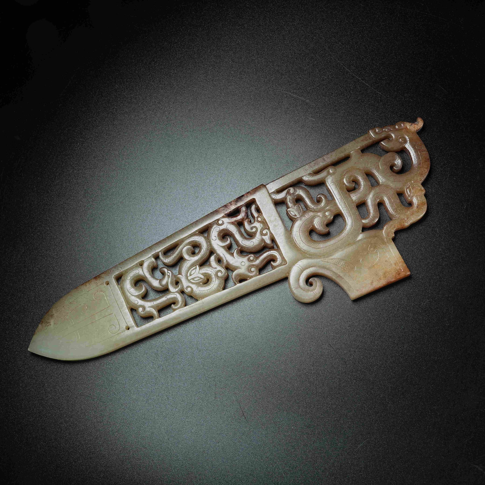 A ANCIENT JADE GE DAGGER CARVED WITH CHI DRAGON PATTERNS: Ancient Jade Ge Dagger Carved with Chi Dragon Patterns