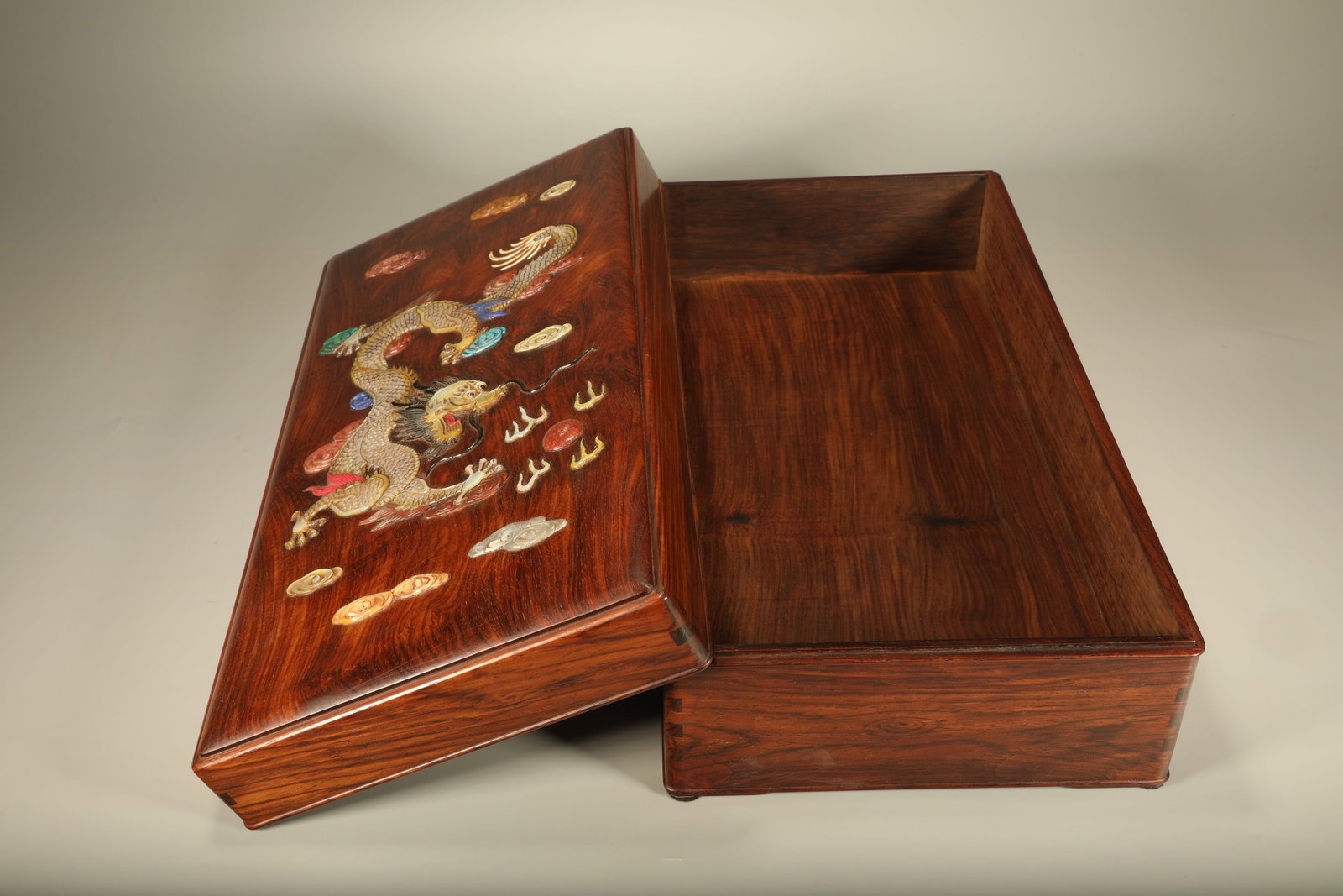 A HUANGHUALI BOX WITH PRECIOUS-STONE INLAY AND DRAGON PATTERNS (1 of 6)