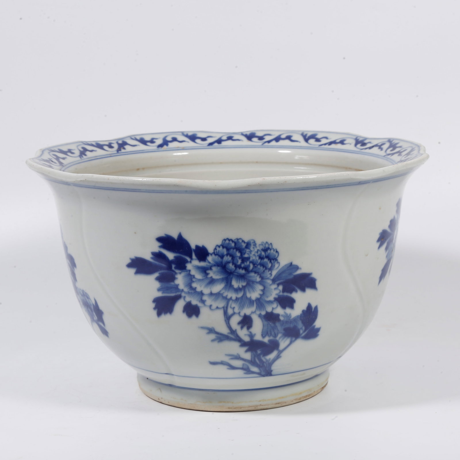 A FLOWER POT WITH BLUE-AND-WHITE PLUCKED-BRANCH FLORAL MOTIF (1 of 9)