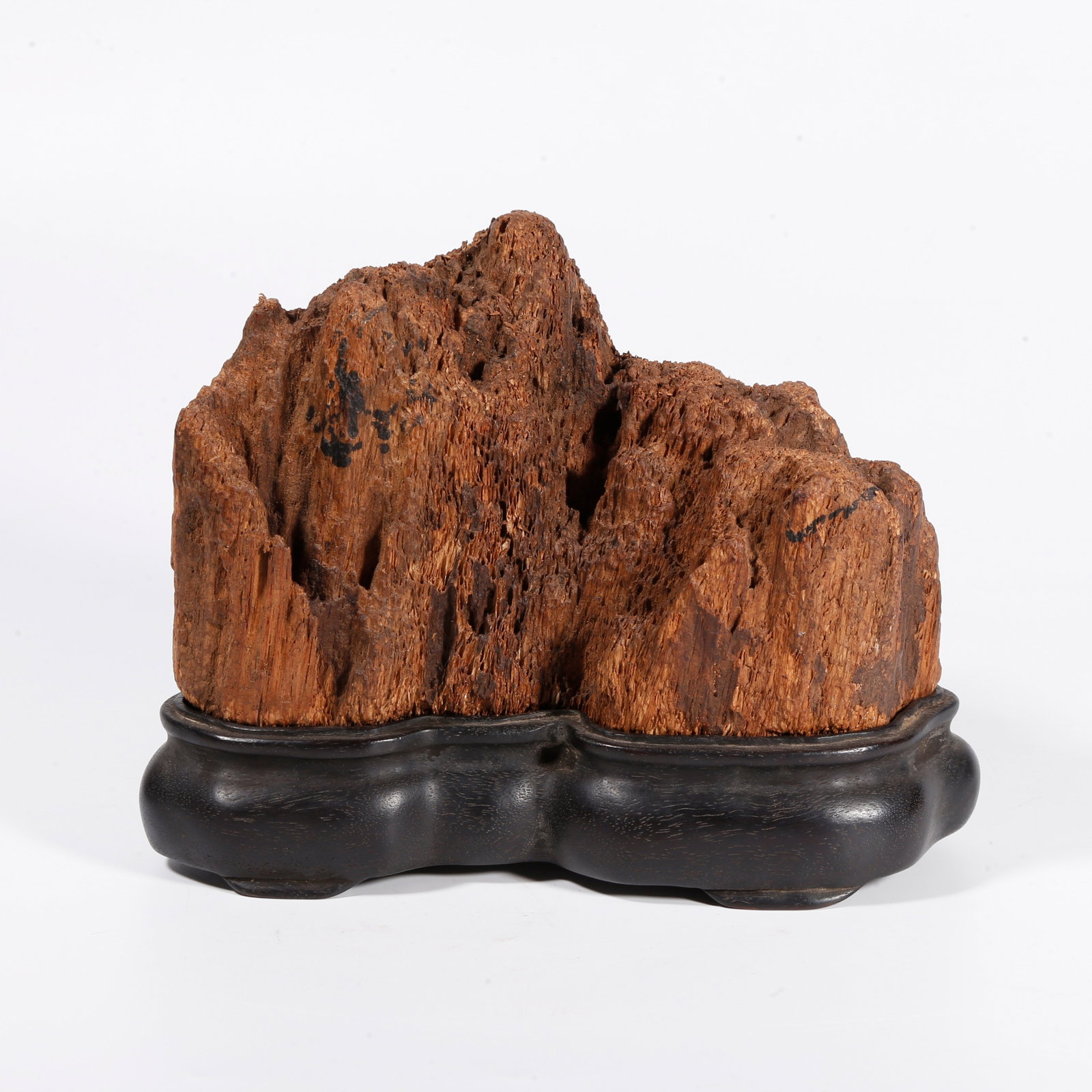 A SCHOLAR'S ROCK ORNAMENT OF HUANGHUALI WOOD: Scholar's rock ornament of huanghuali wood