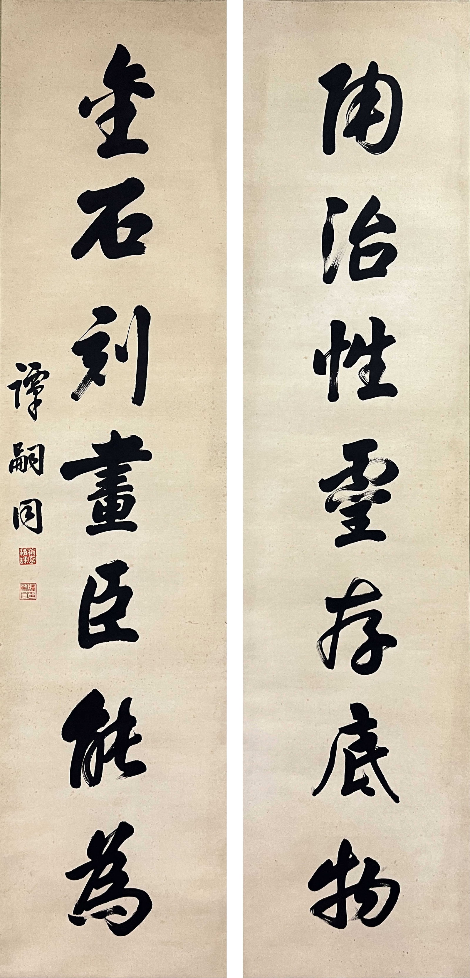 A CALLIGRAPHY COUPLET HANGING SCROLL ON PAPER BY TAN SITONG.譚嗣同: Calligraphy couplet hanging scroll on paper by Tan Sitong.譚嗣同