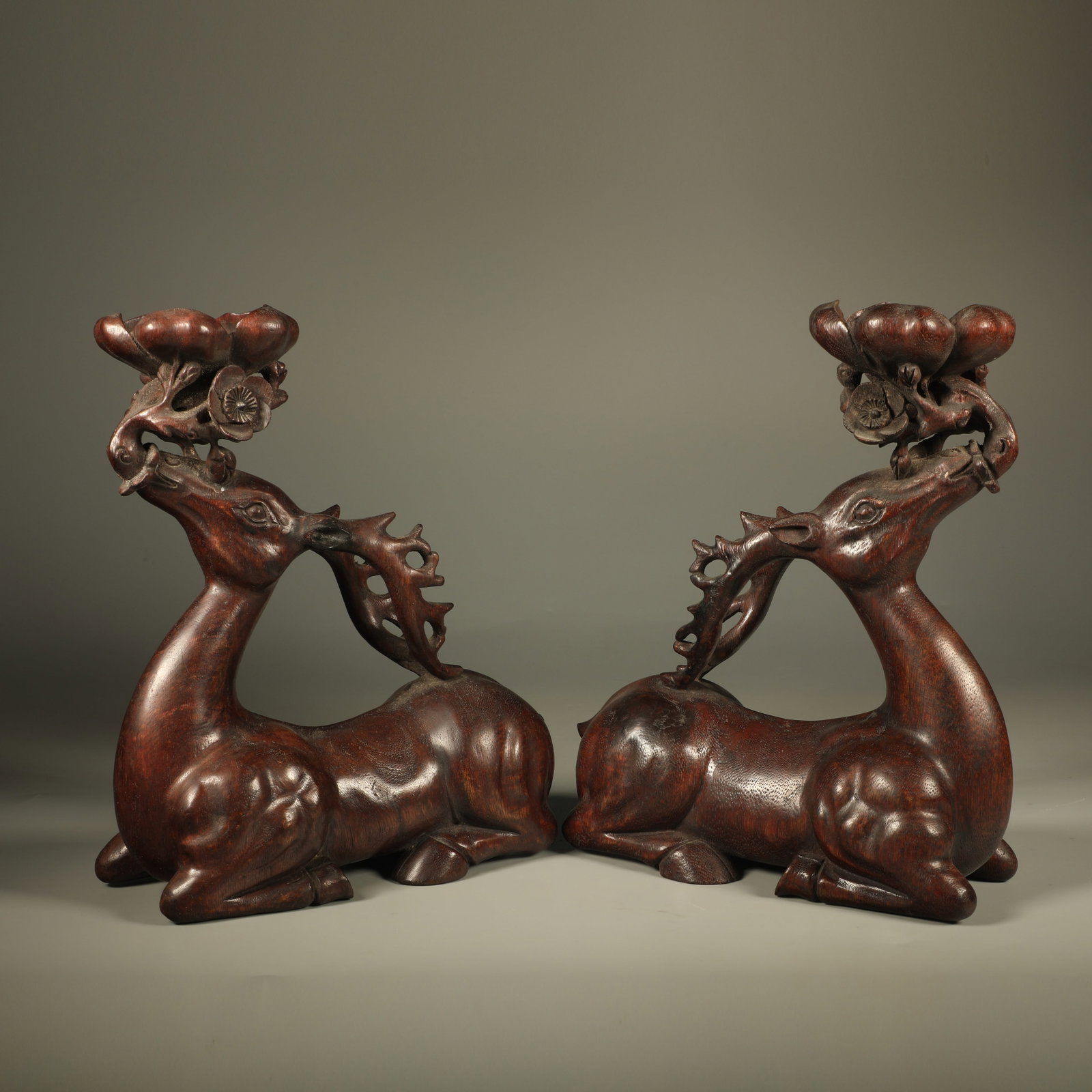 A PAIR OF CHENXIANG CANDLE HOLDERS CARVED WITH DEER PRESENTING PLUM BLOSSOMS (1 of 7)