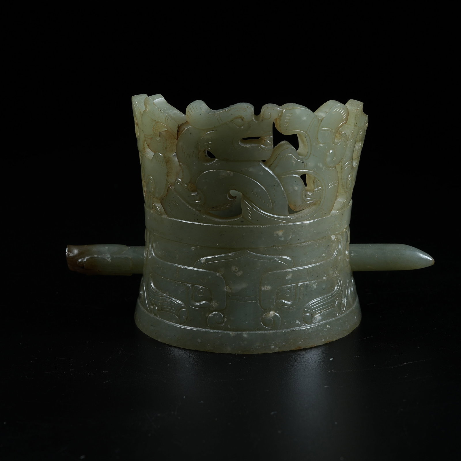 A HETIAN JADE HAIR BAND CARVED WITH BEAST MASK PATTERNS: Hetian Jade Hair Band Carved with Beast Mask Patterns