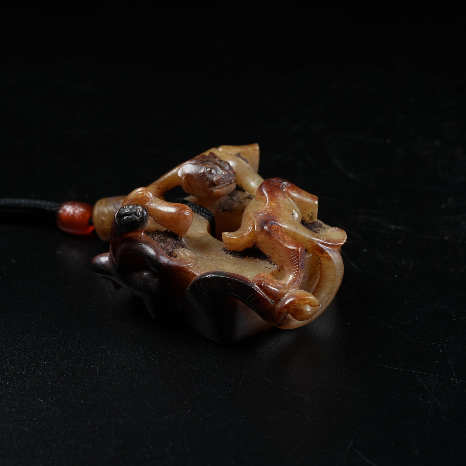 A ANCIENT JADE PENDANT WITH CHI DRAGON PATTERN (1 of 8)
