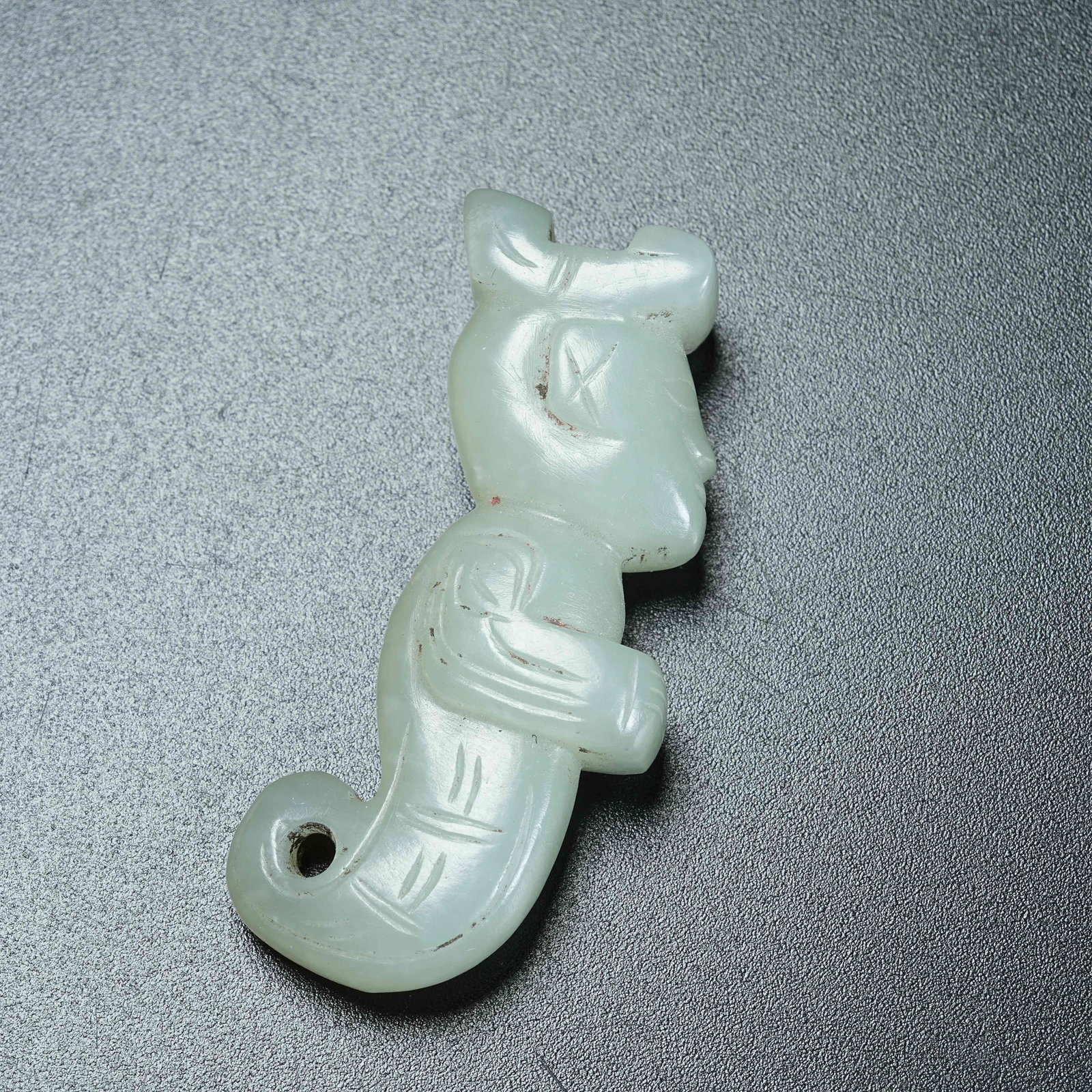 A ANCIENT JADE DIVINE FIGURE PENDANT (1 of 9)