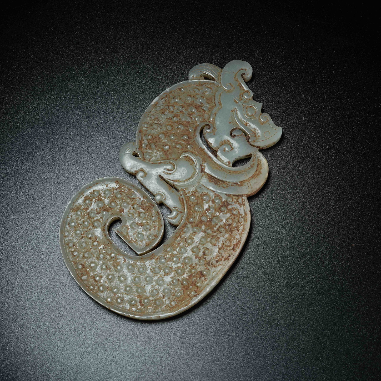 A ANCIENT JADE S-SHAPED DRAGON PENDANT: Ancient Jade S-shaped Dragon Pendant