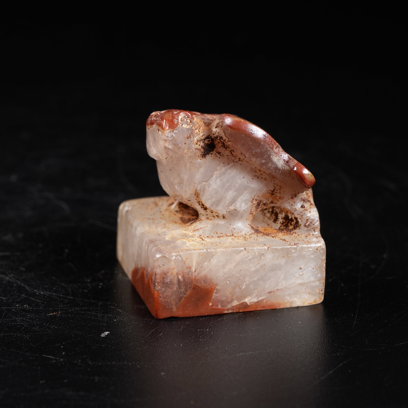 A WARRING STATES RED AGATE SEAL WITH PHOENIX KNOB (1 of 7)