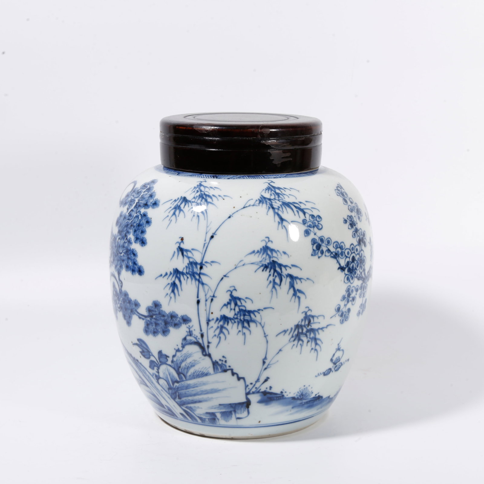 A COVERED JAR WITH BLUE-AND-WHITE THREE-FRIENDS-OF-WINTER MOTIF: Covered jar with blue-and-white three-friends-of-winter motif