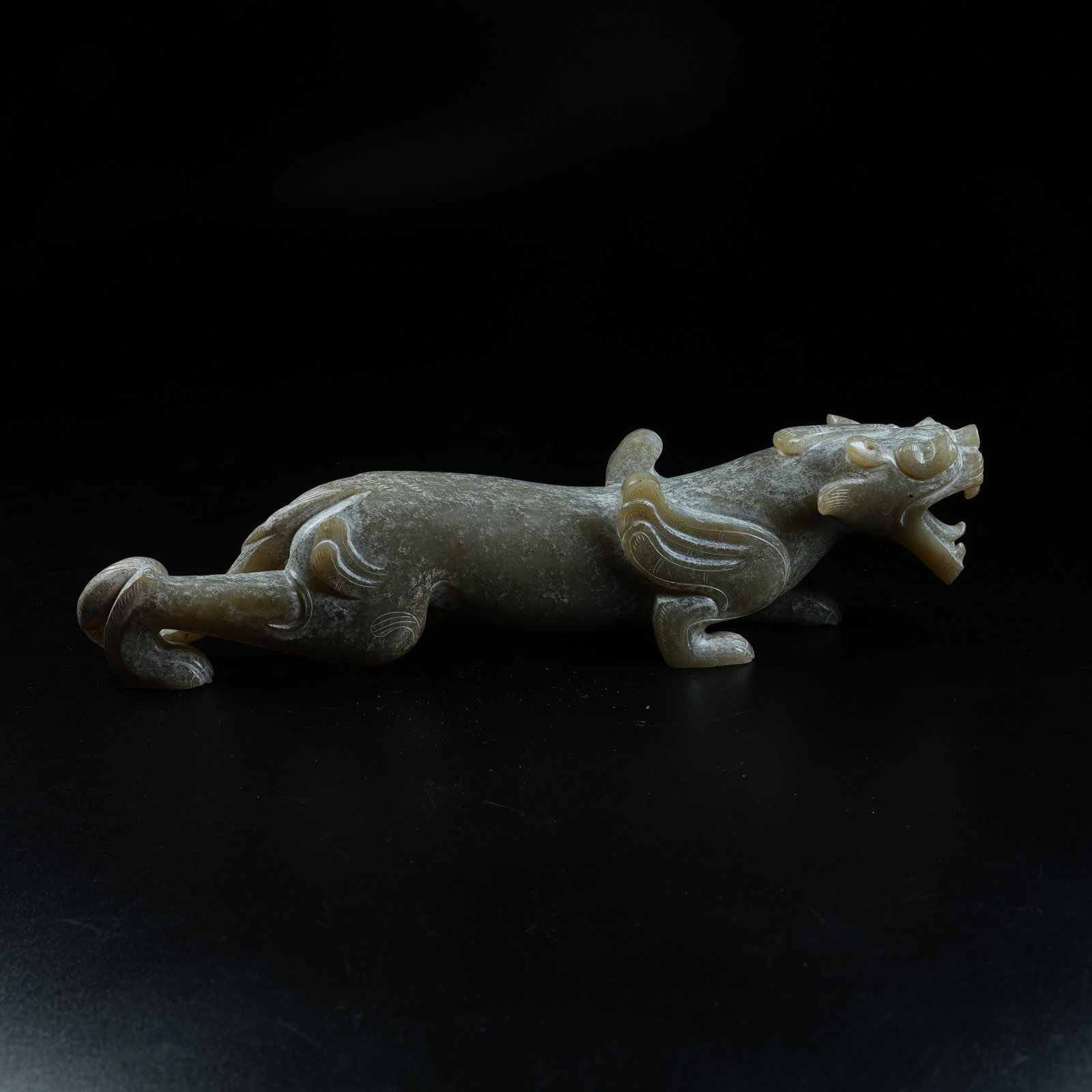 A ANCIENT JADE AUSPICIOUS BEAST ORNAMENT: Ancient Jade Auspicious Beast Ornament