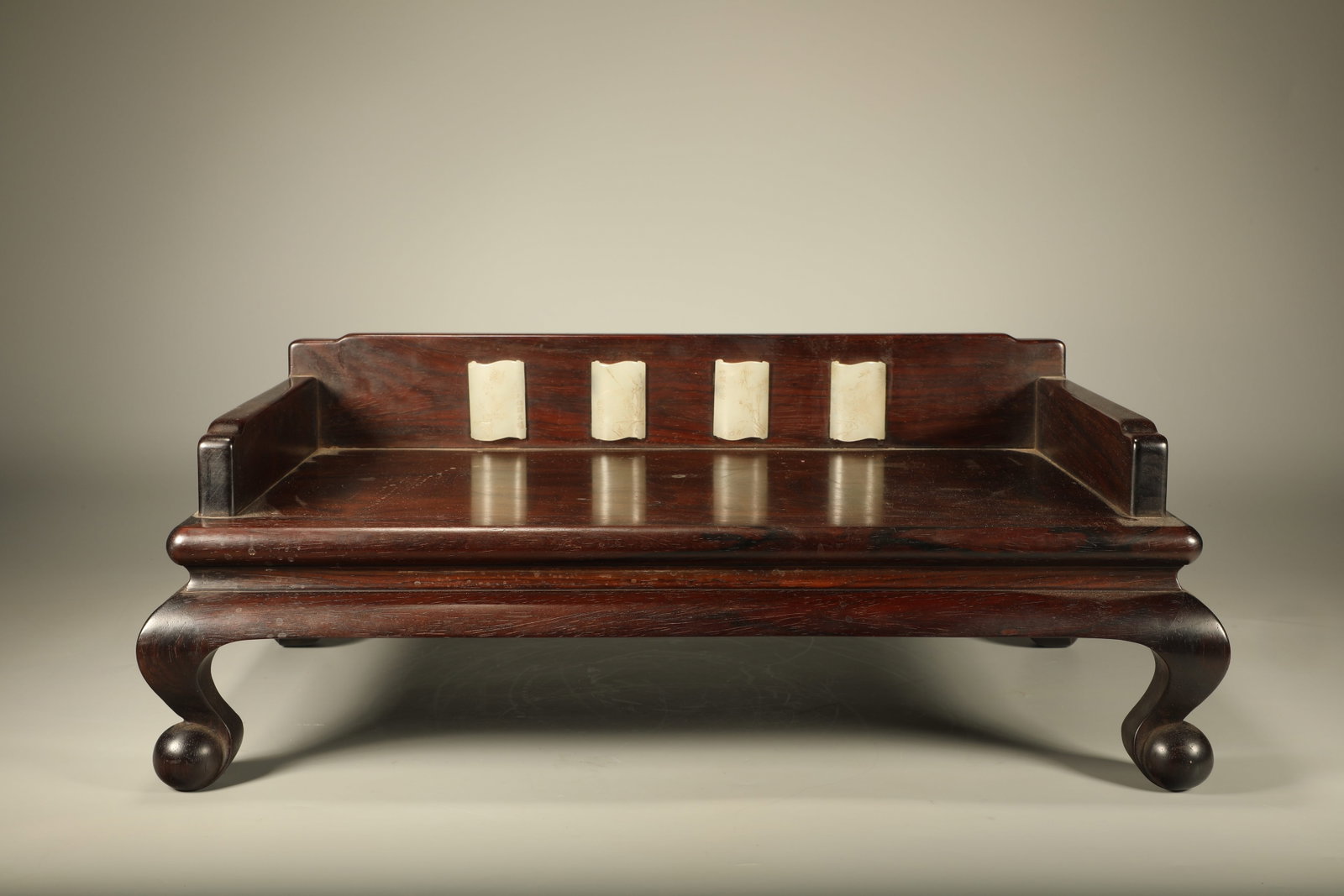 A HUANGHUALI THRONE INLAID WITH JADE CARVED WITH PLUM-ORCHID-BAMBOO-CHRYSANTHEMUM PATTERNS (1 of 6)