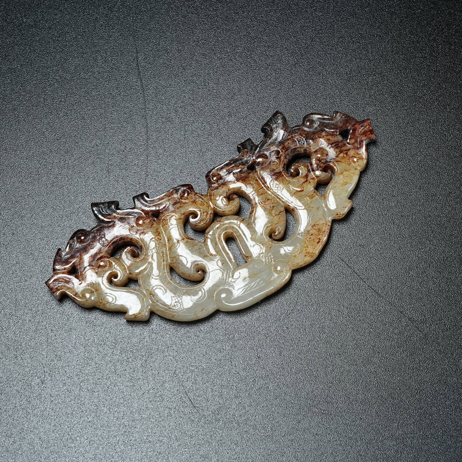 A ANCIENT JADE ASSEMBLED PENDANT WITH DRAGON PATTERN (1 of 8)