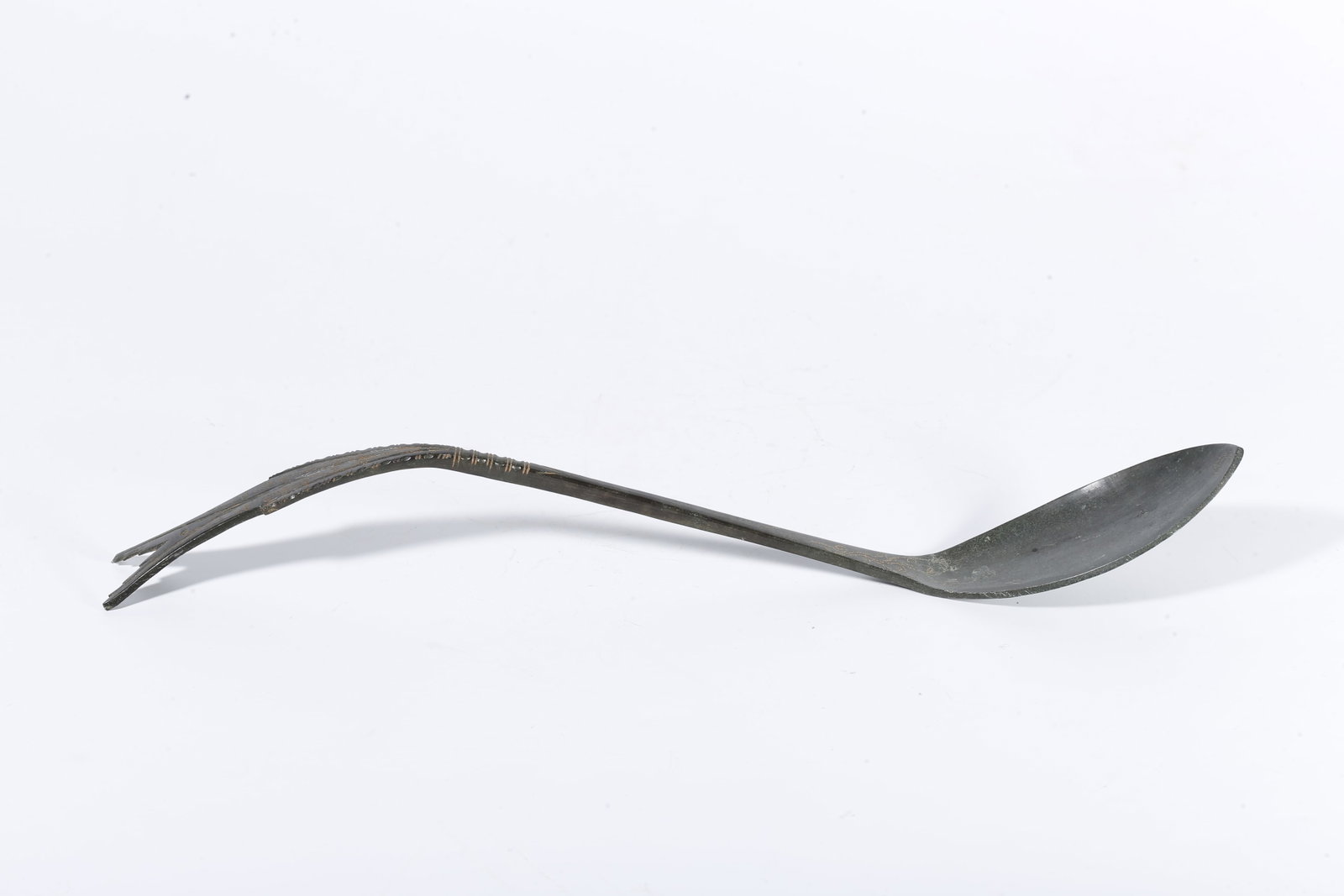 A BRONZE SWALLOW-TAIL SPOON (1 of 10)