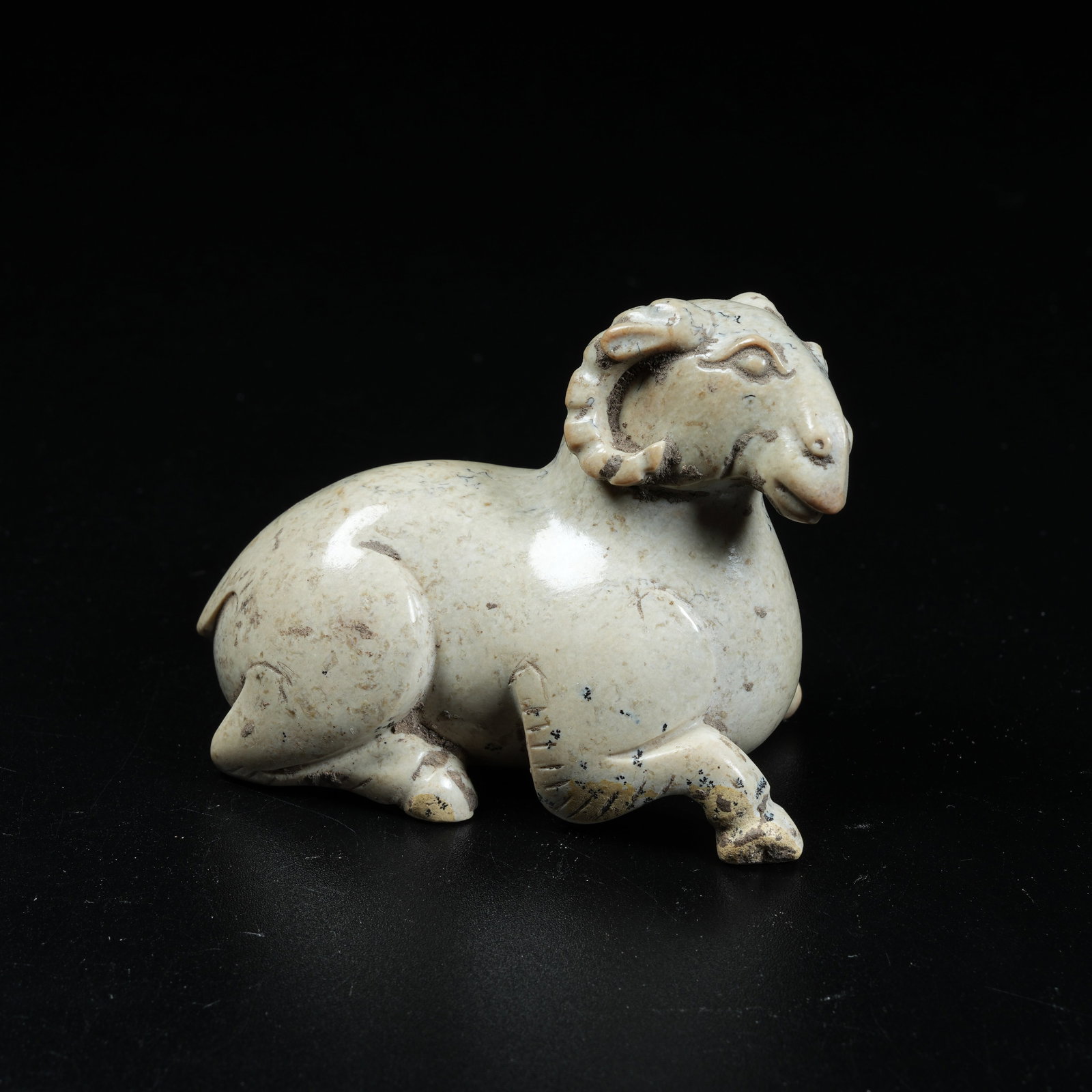 A ANCIENT JADE RECLINING GOAT ORNAMENT (1 of 8)