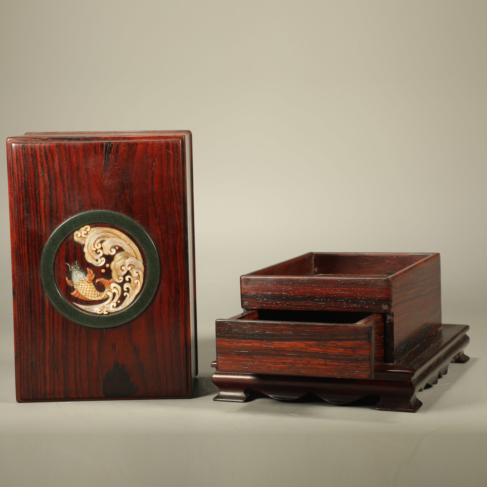 A HUANGHUALI COVERED BOX INLAID WITH PRECIOUS STONES FEATURING SURPLUS-YEAR-AFTER-YEAR MOTIFS: Huanghuali Covered Box Inlaid with Precious Stones Featuring Surplus-year-after-year Motifs