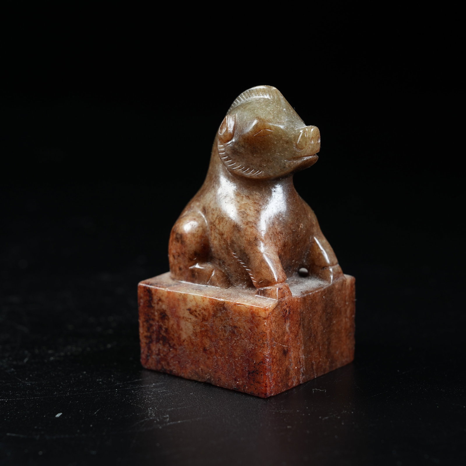 A ANCIENT JADE SEAL WITH PIG KNOB: Ancient Jade Seal with Pig Knob