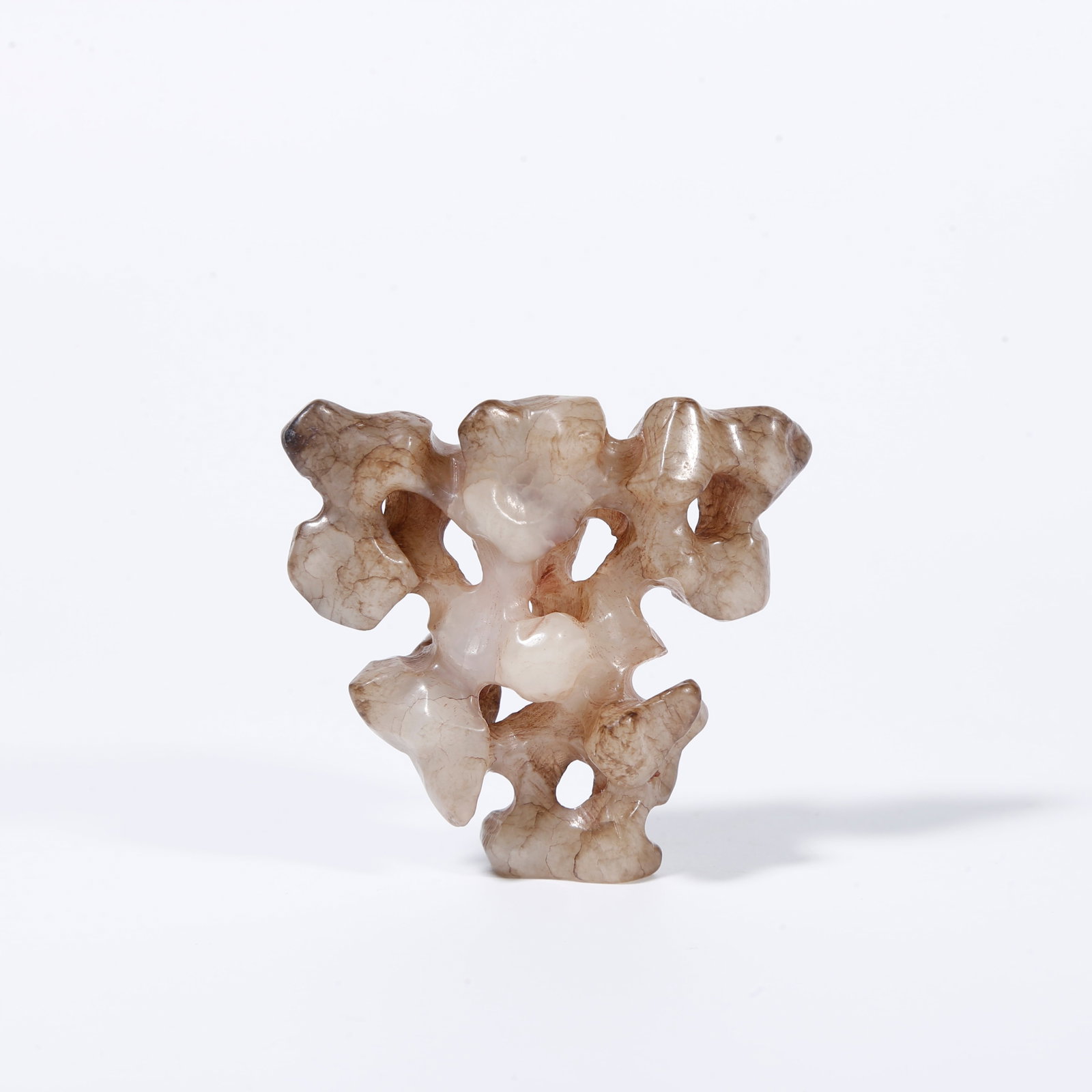 A HETIAN JADE MOUNTAIN-FORM ORNAMENT: Hetian jade mountain-form ornament