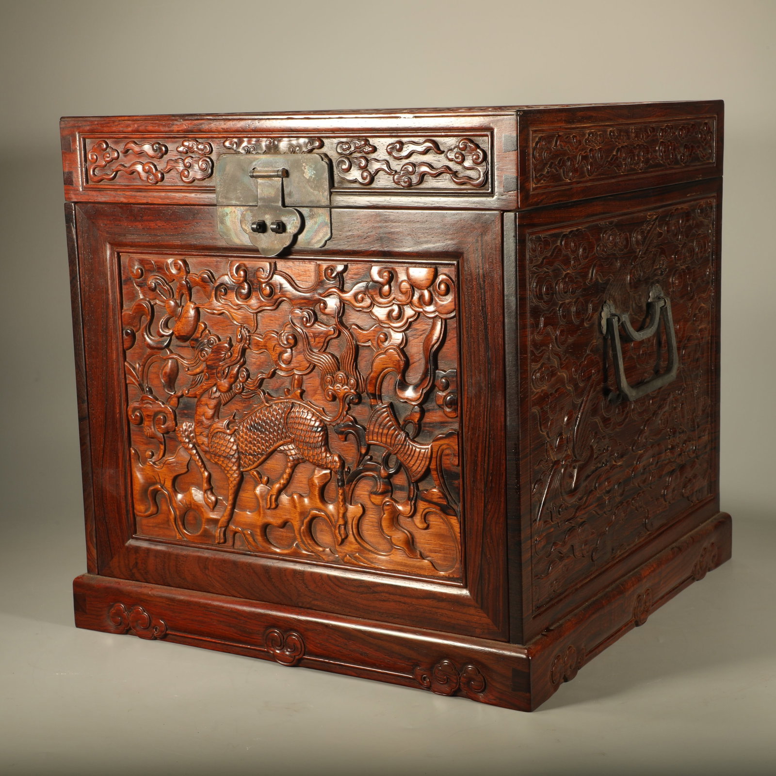 A HUANGHUALI TREASURE BOX CARVED WITH QILIN AND CRANE PATTERNS (1 of 7)