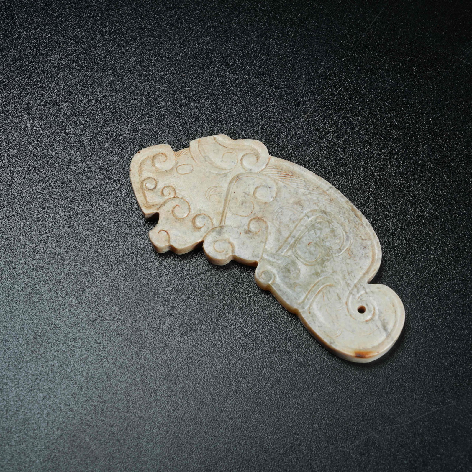 A ANCIENT JADE BEAST-SHAPED PENDANT: Ancient Jade Beast-shaped Pendant