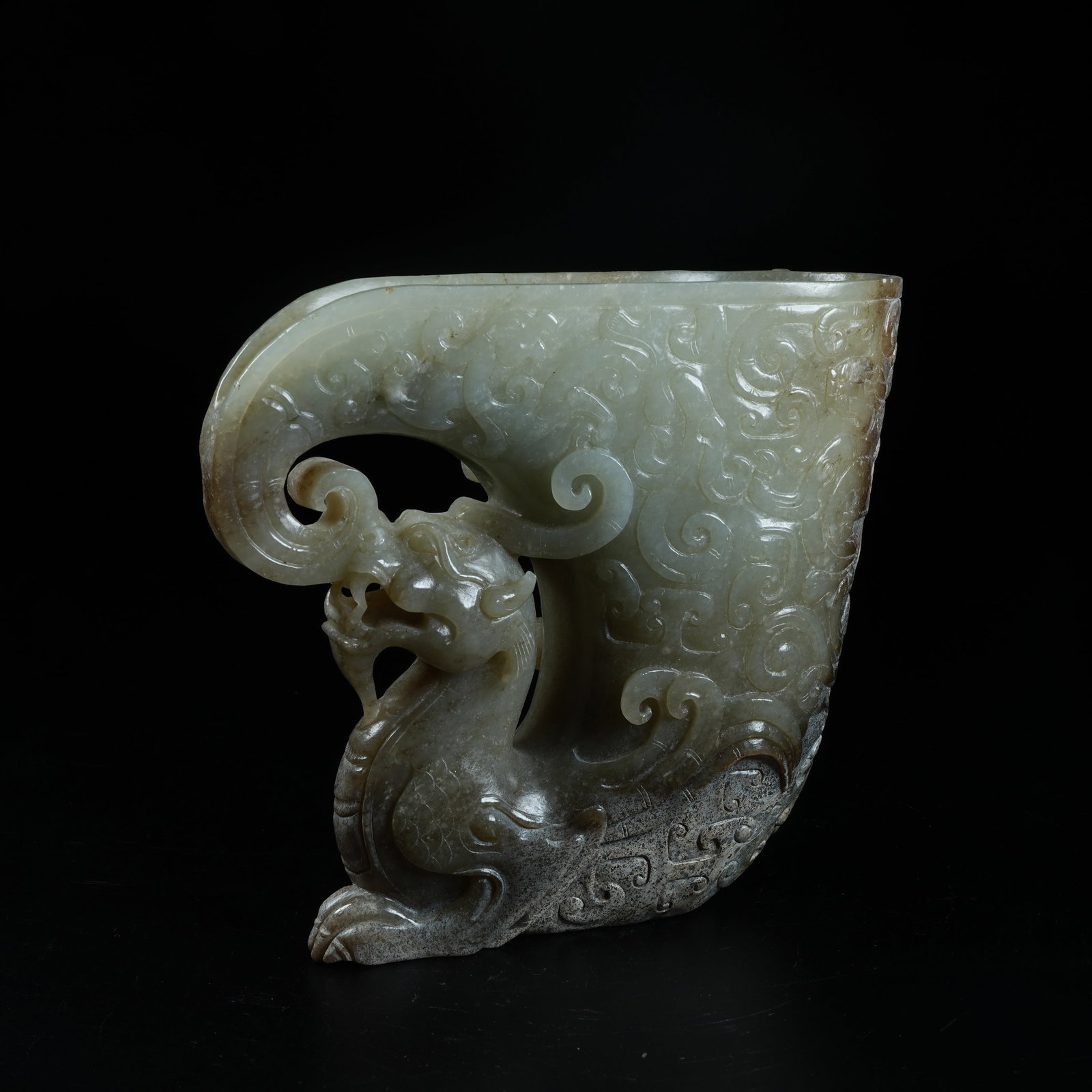 A ANCIENT JADE HORN CUP IN AUSPICIOUS BEAST FORM: Ancient Jade Horn Cup in Auspicious Beast Form