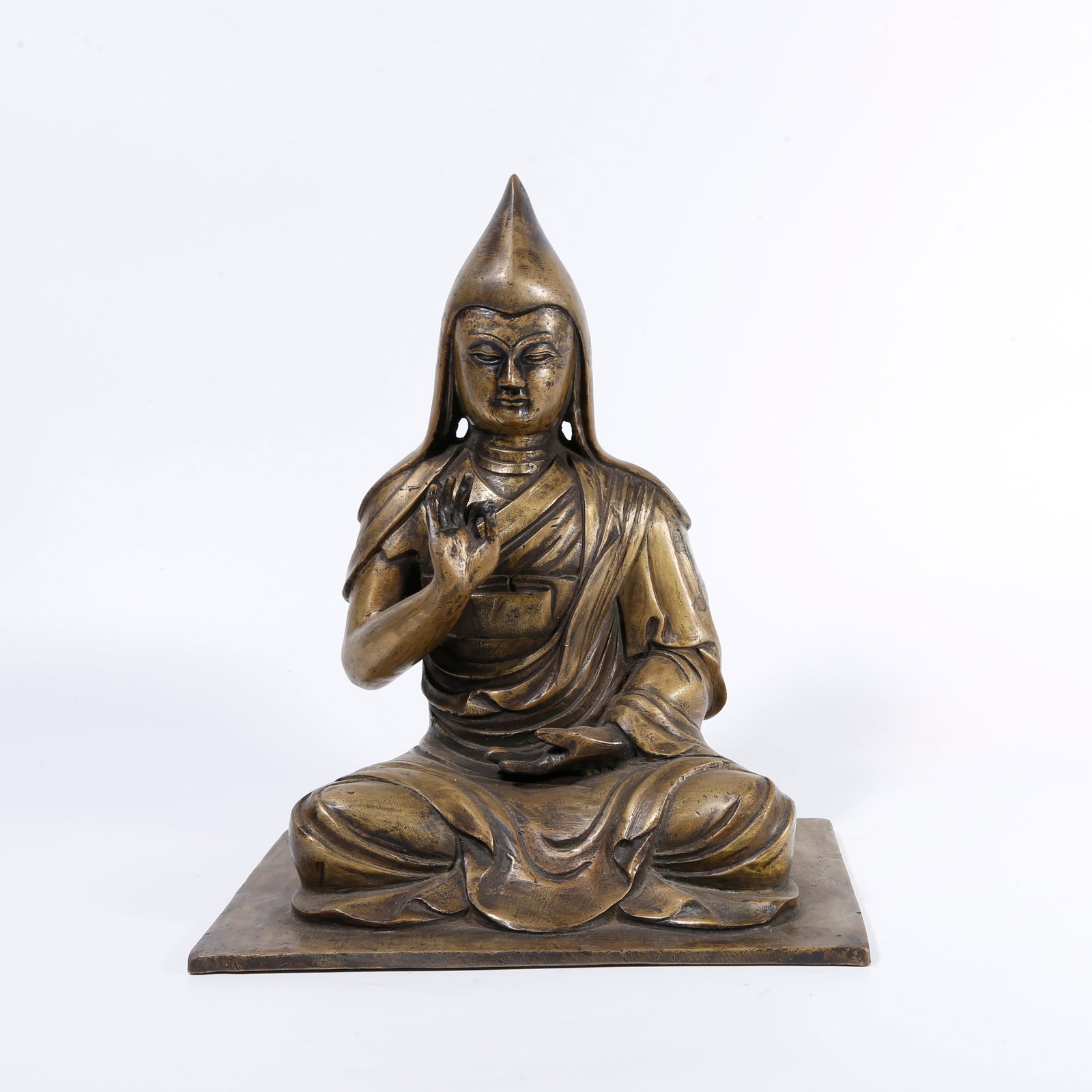 A BRONZE LAMA MASTER STATUE: Bronze Lama master statue