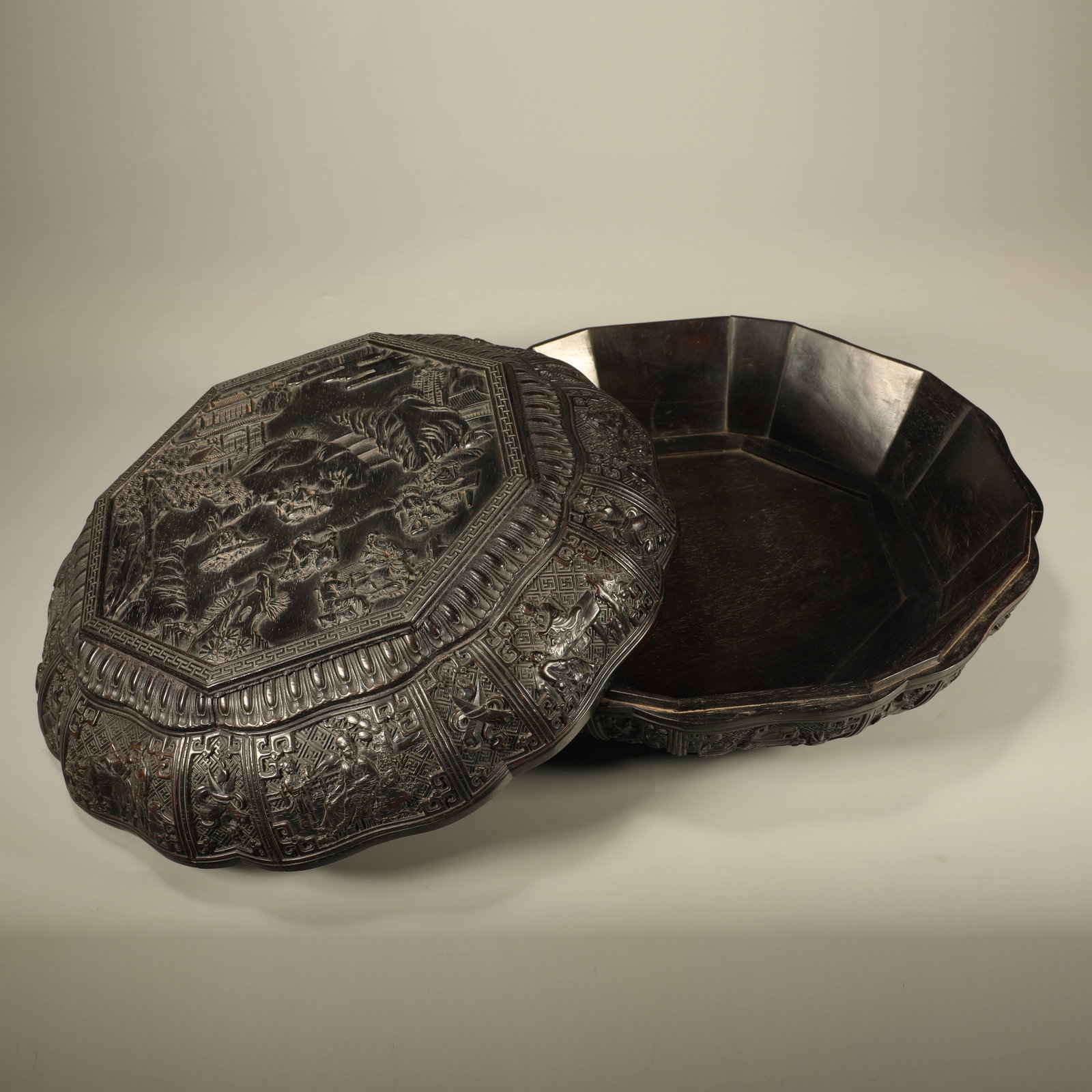 A SANDALWOOD HAND-HELD BOX CARVED WITH LANDSCAPE AND FIGURE SCENES (1 of 7)