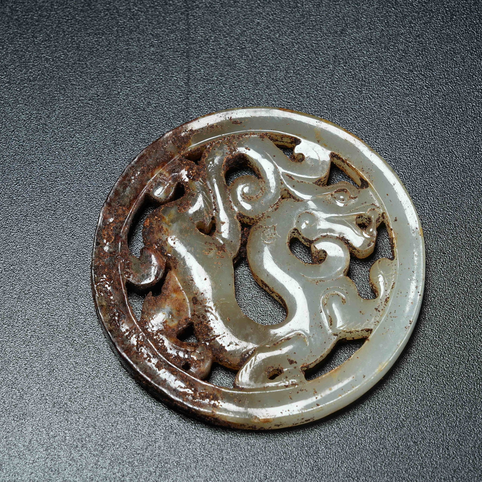 A ANCIENT JADE BI DISC WITH CHI DRAGON PATTERN (1 of 8)