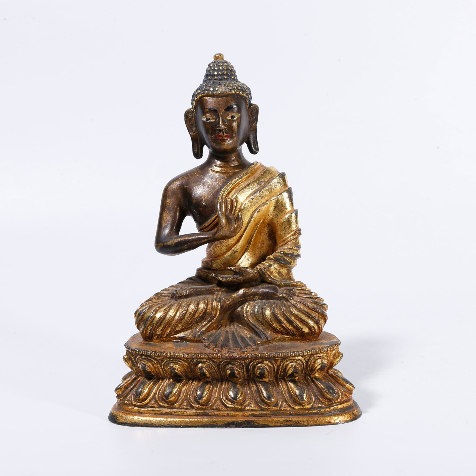 A GILT-BRONZE BUDDHA STATUE (1 of 9)