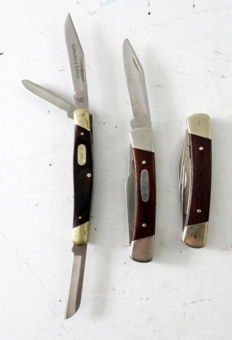 (3) BUCK WOOD HANDLE FOLDING KNIVES: (3) BUCK WOOD HANDLE FOLDING KNIVES