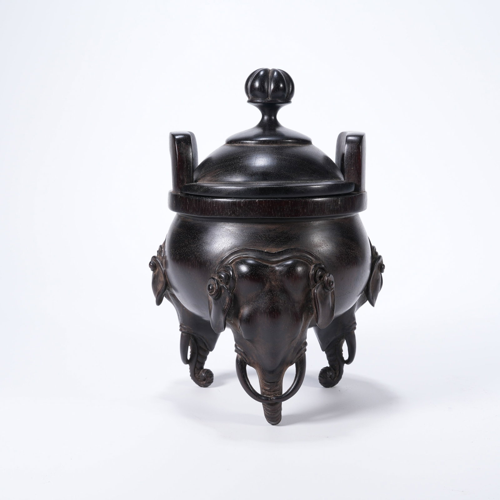 A ZITAN WOOD CENSER WITH ELEPHANT-SHAPED FEET: Zitan wood censer with elephant-shaped feet