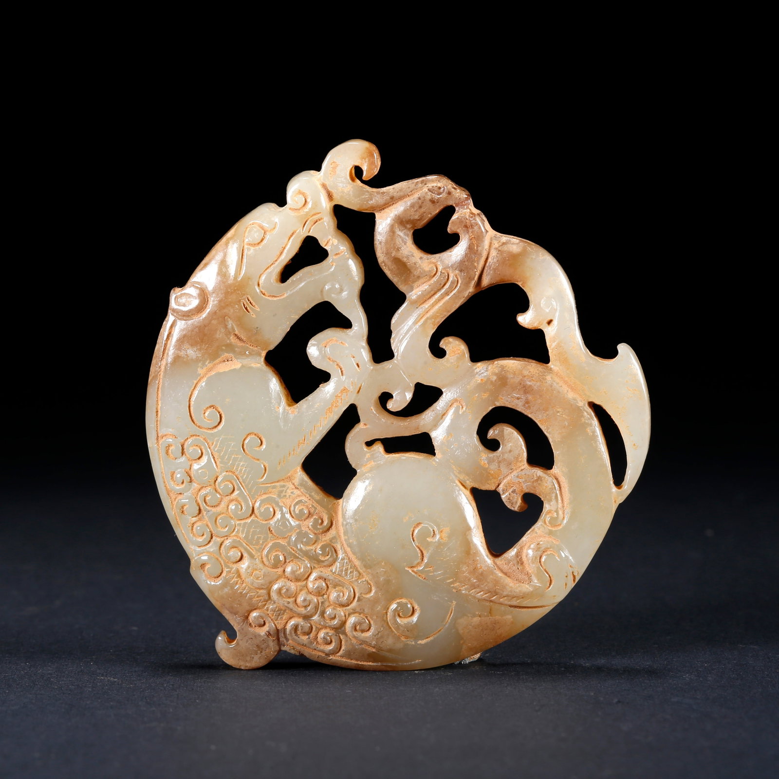 A ARCHAIC JADE PENDANT CARVED WITH DRAGON AND PHOENIX PATTERN: Archaic Jade Pendant Carved with Dragon and Phoenix Pattern