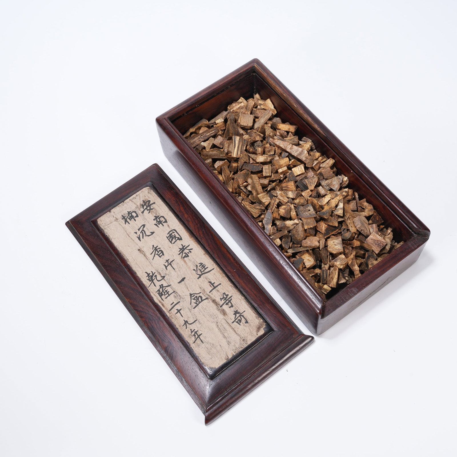 A ONE BOX OF AGARWOOD SLICES: One box of agarwood slices