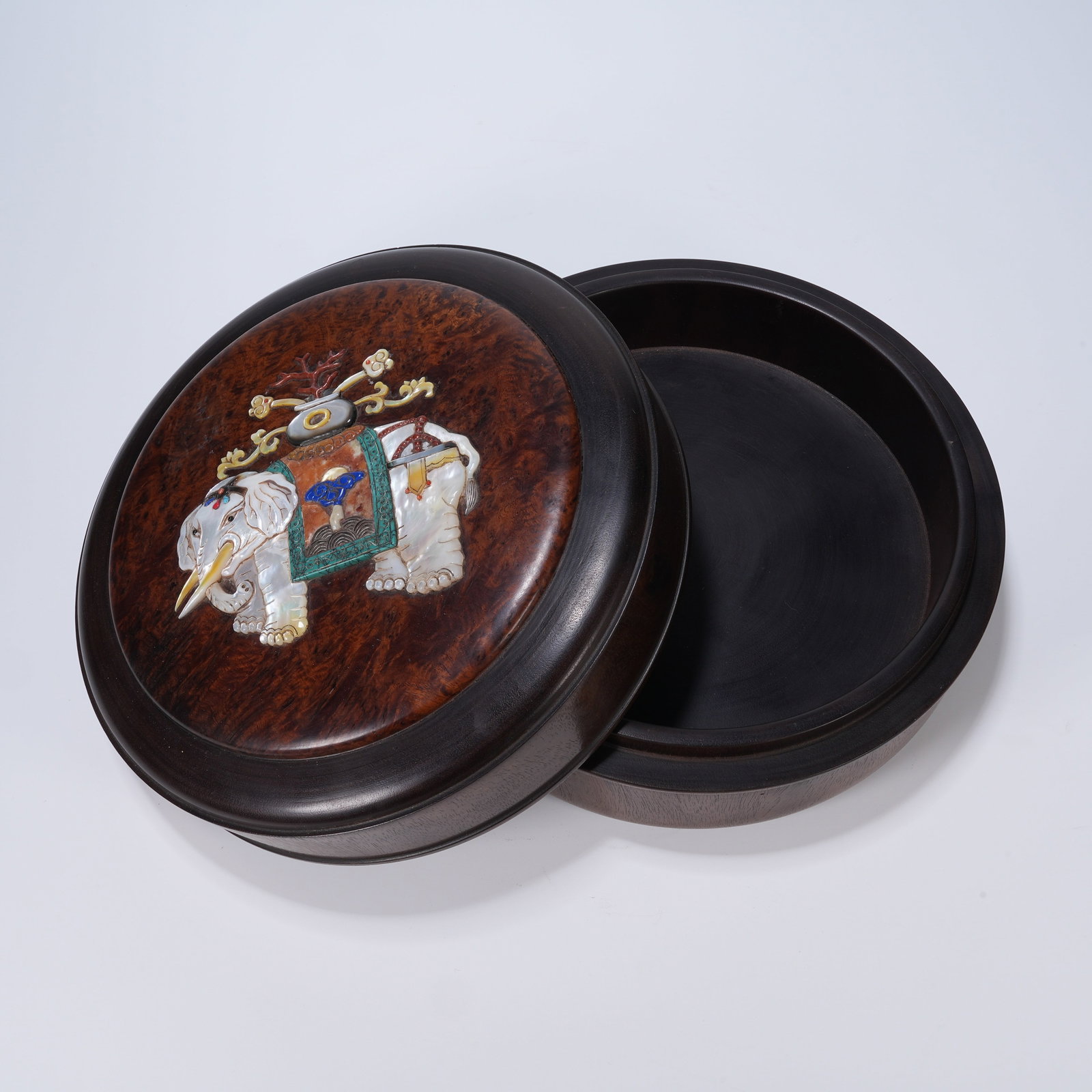 A HUANGHUALI COVERED BOX WITH PRECIOUS-STONE INLAY DEPICTING PEACEFUL ELEPHANT MOTIF: Huanghuali covered box with precious-stone inlay depicting peaceful elephant motif