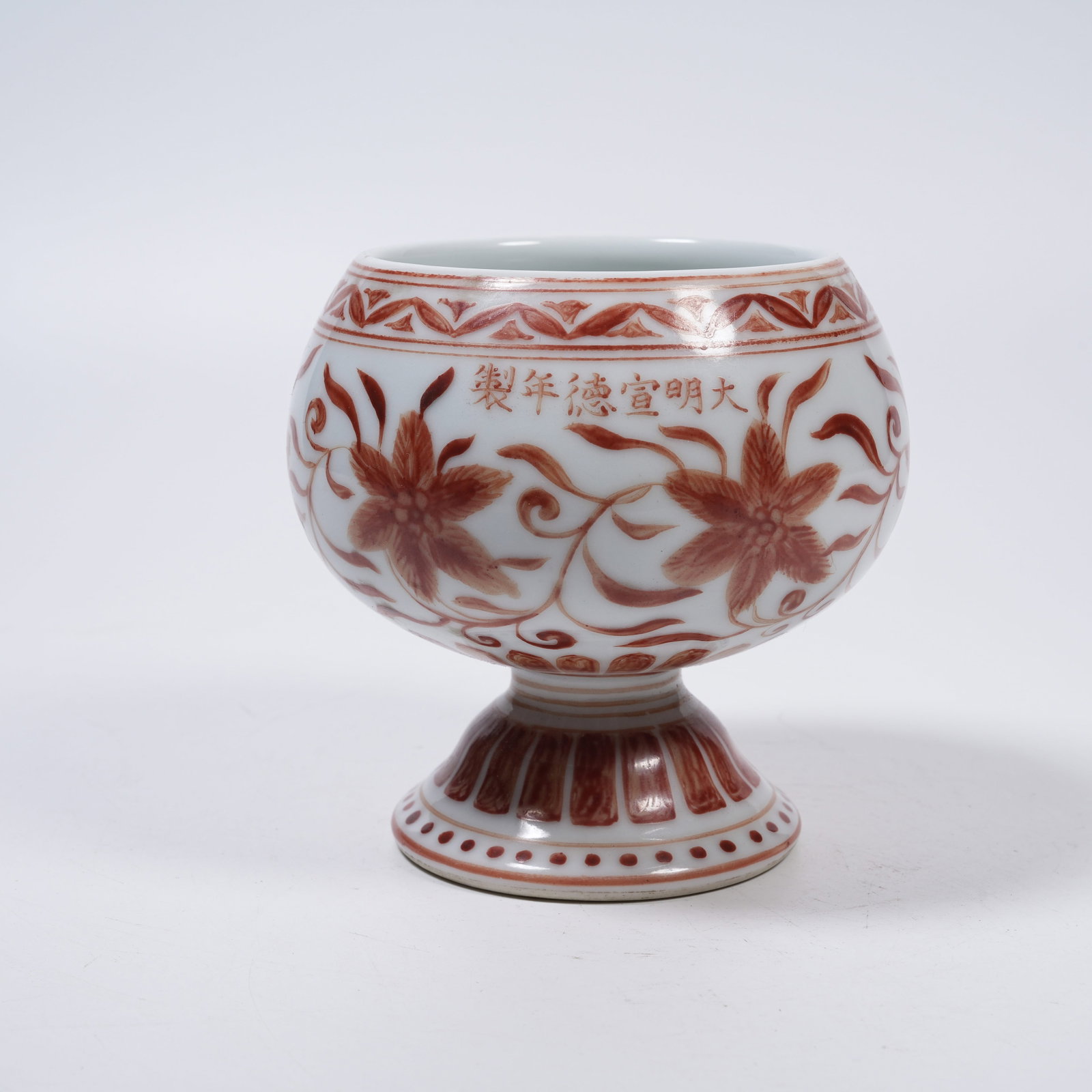 A IRON RED STEM CUP WITH FLORAL PATTERNS (1 of 9)