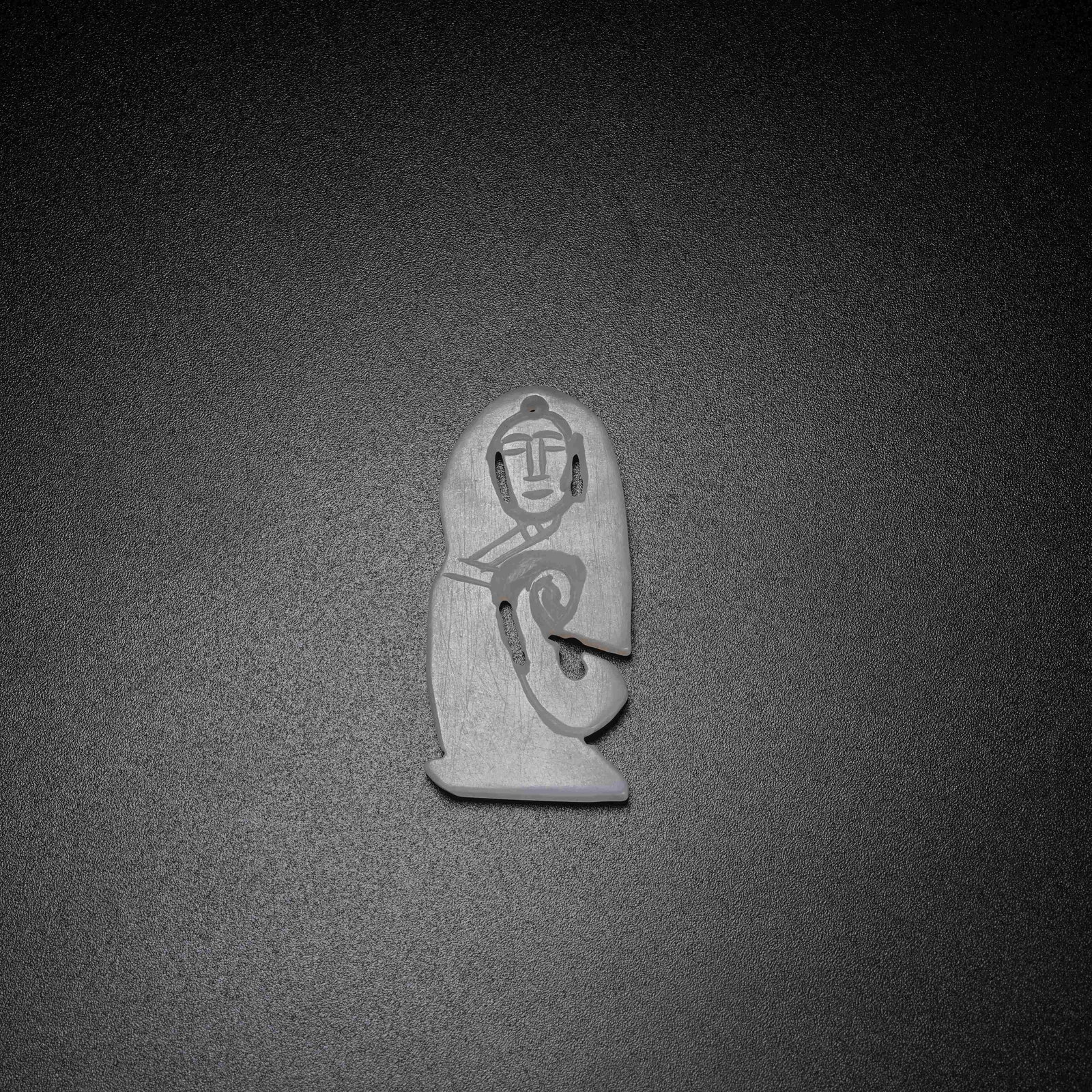 A ARCHAIC JADE DANCING FIGURE PENDANT: Archaic Jade Dancing Figure Pendant
