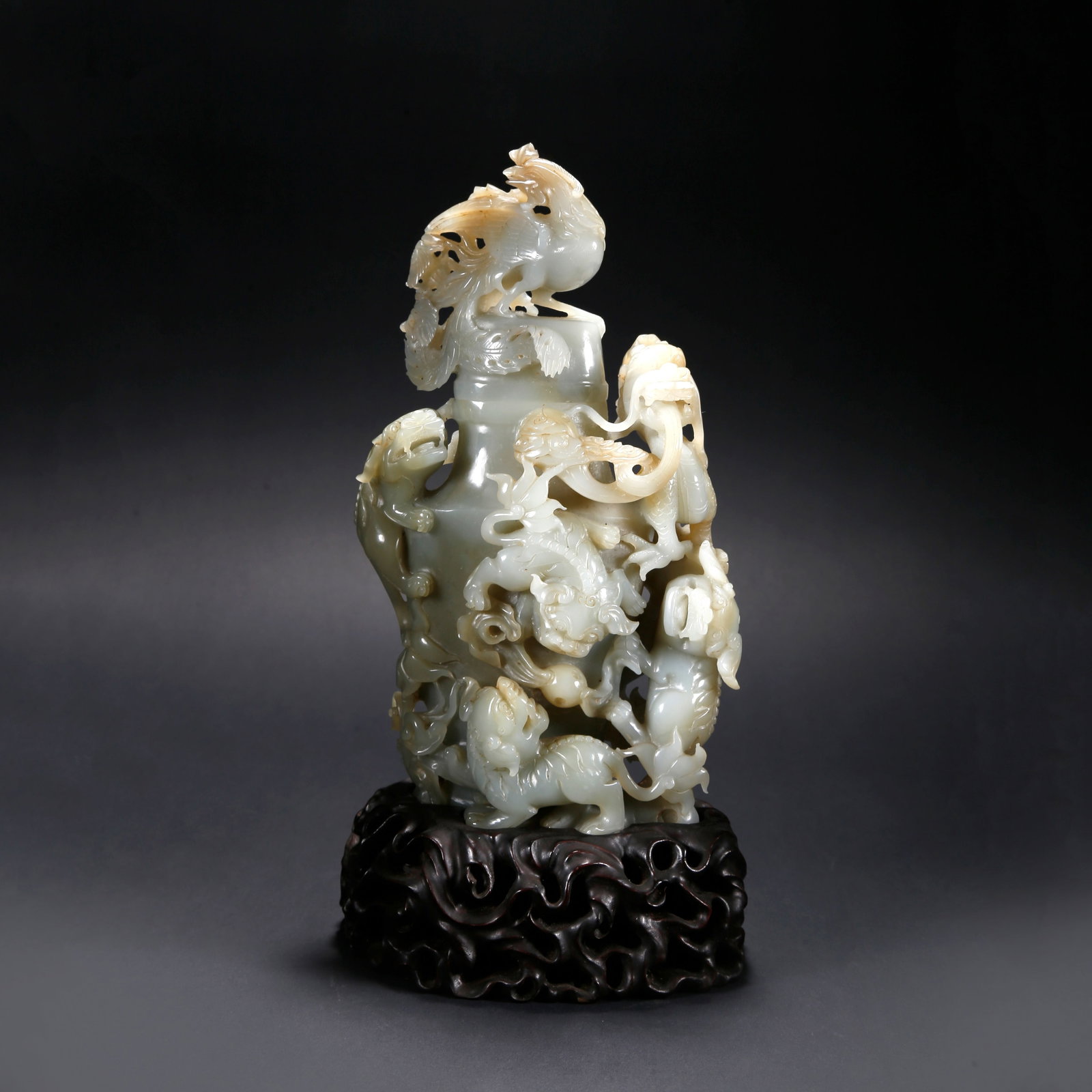 A HETIAN JADE LIDDED VASE WITH PHOENIX KNOB: Hetian Jade Lidded Vase with Phoenix Knob